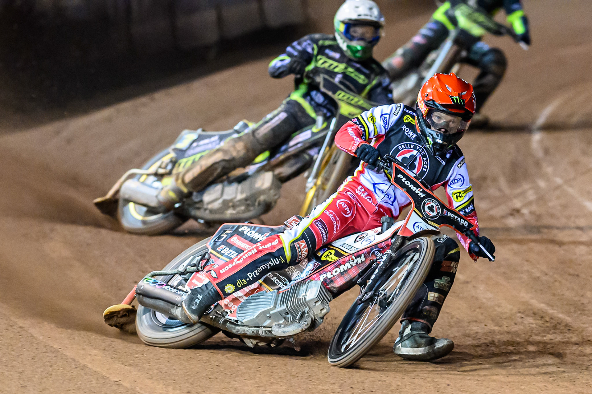 Dan Bewley of Belle Vue Aces  in Red leading Jason Doyle of Ipswich Witches  in White during the Rowe Motor Oil Premiership Play Off Semi Final 1 (1st Leg)  between Belle Vue Aces and Ipswich Witches at the National Speedway Stadium, Manchester on Monday 8th September 2025. (Photo: Ian Charles | MI News)