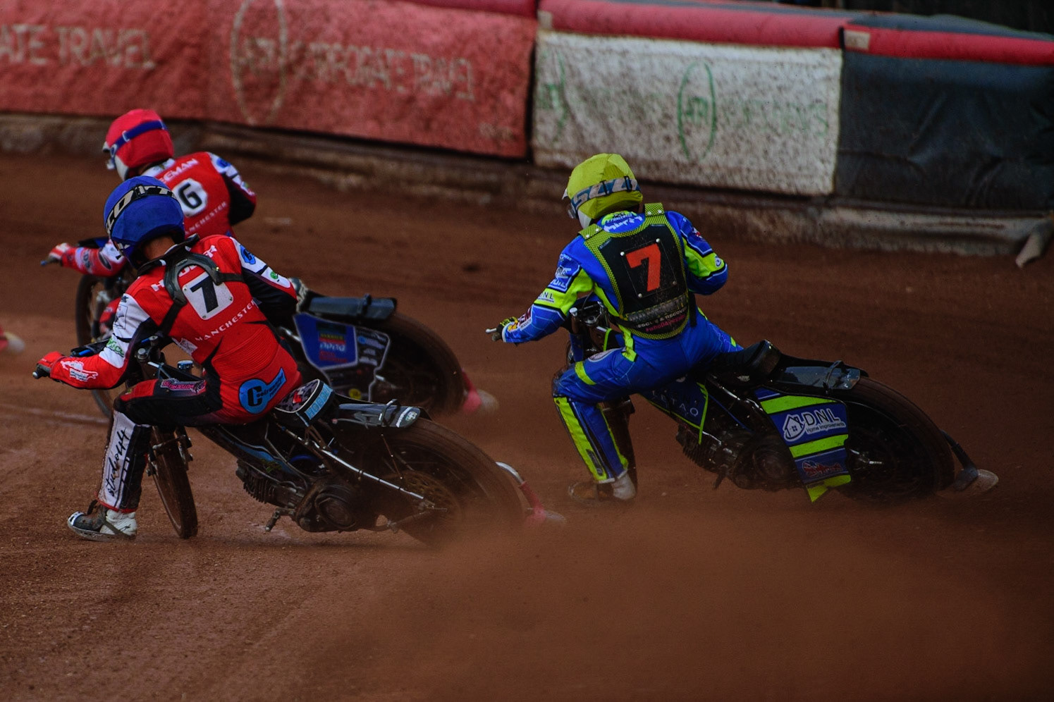Freddy Hodder  (Blue) inside Luke Muff  (Yellow) with Archie Freeman  (Red) in front during the National Development League match between Belle Vue Colts and Mildenhall Fens Tigers at the National Speedway Stadium, Manchester on Friday 15th July 2022. (Credit: Ian Charles | MI News)