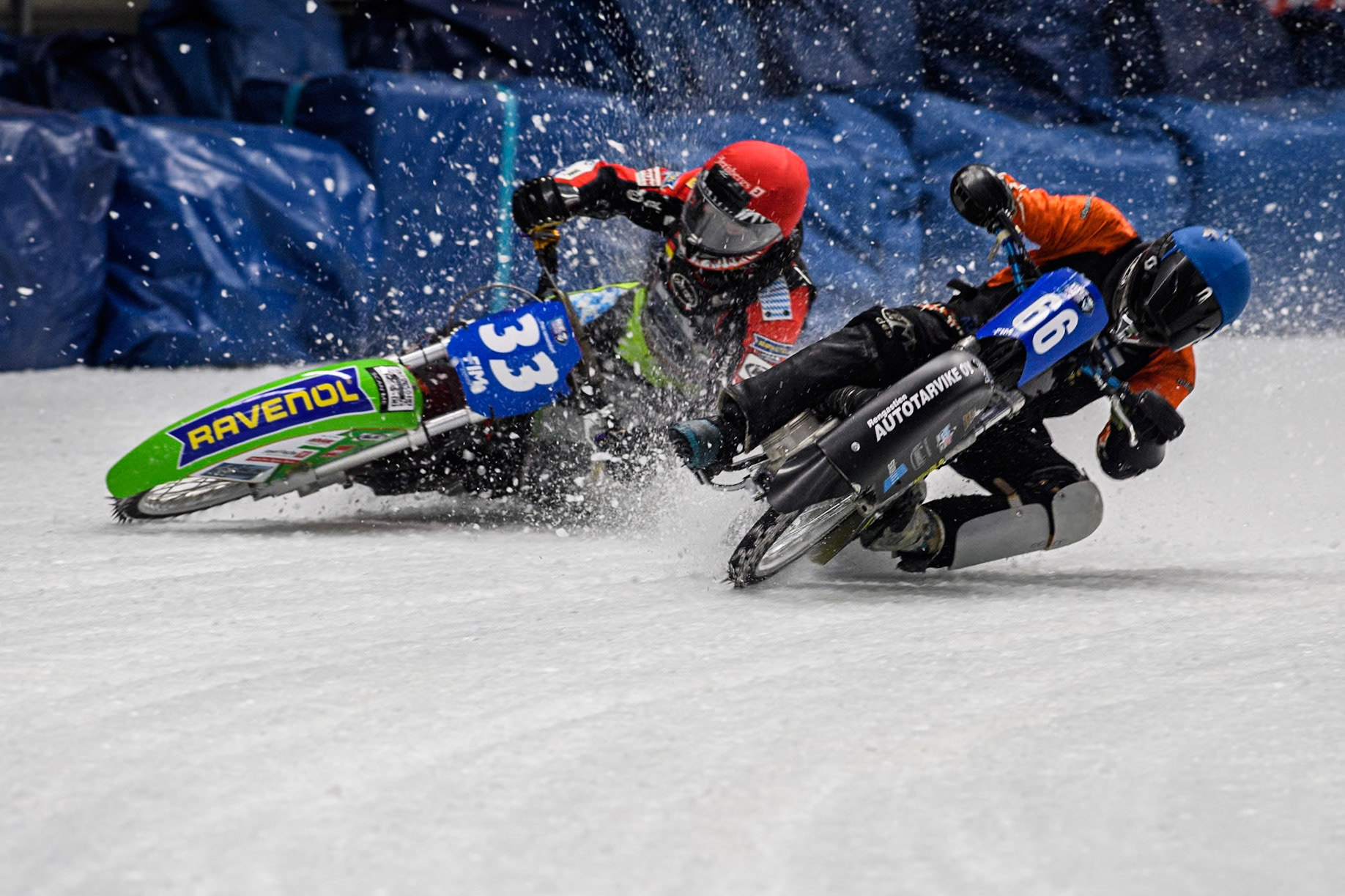 Finland's Aki Ala-Riihimäki (66) (Blue) gets into difficulty as he challenges Germany's Johann Weber (33) (Red) during the FIM Ice Speedway Gladiators World Championship Final 1 at the Max-Aicher-Arena, Inzell on Saturday 23 March 2024. (Photo: Ian Charles | MI News)
