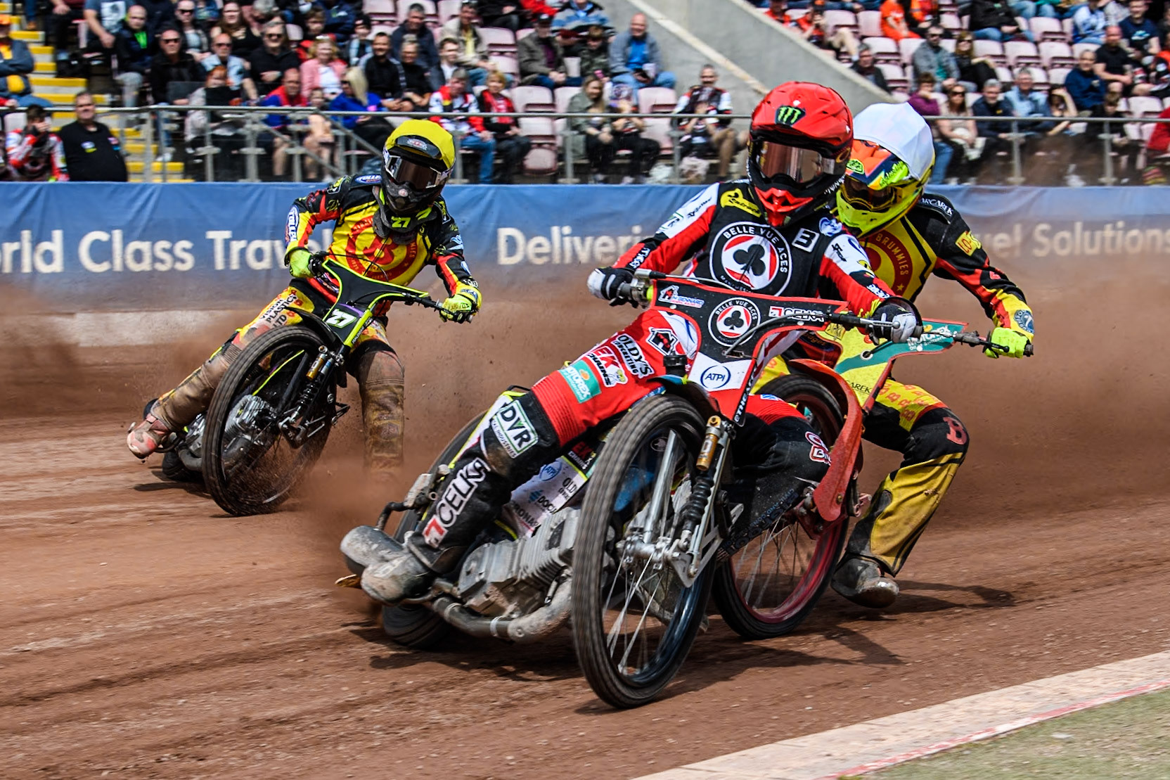 Belle Vue Aces' Jaimon Lidsey  in Red leading Birmingham Brummies' Vaclav Milik  in White and Birmingham Brummies' Tom Brennan  in Yellow during the Rowe Motor Oil Premiership match between Belle Vue Aces and Birmingham Brummies at the National Speedway Stadium, Manchester on Monday 6th May 2024. (Photo: Ian Charles | MI News)