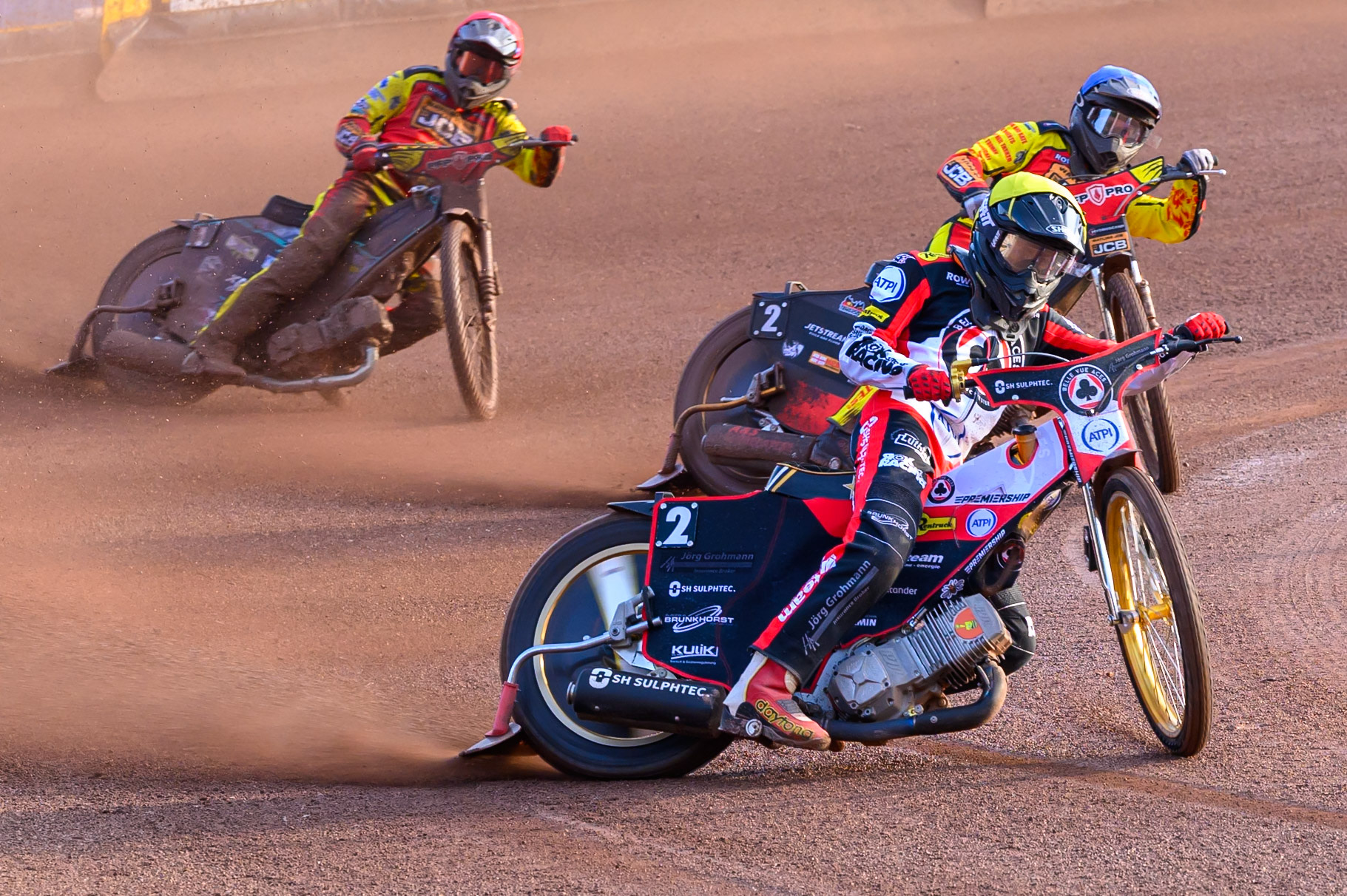 Norick Blodorn of Belle Vue Aces  in Yellow leading Dan Thompson of Leicester Lions  in Blue and Ryan Douglas of Leicester Lions in Red during the Rowe Motor Oil Premiership match between Leicester Lions and Belle Vue Aces at the Hydroscan Arena, Leicester on Thursday 23rd July 2026. (Photo: Ian Charles | MI News)