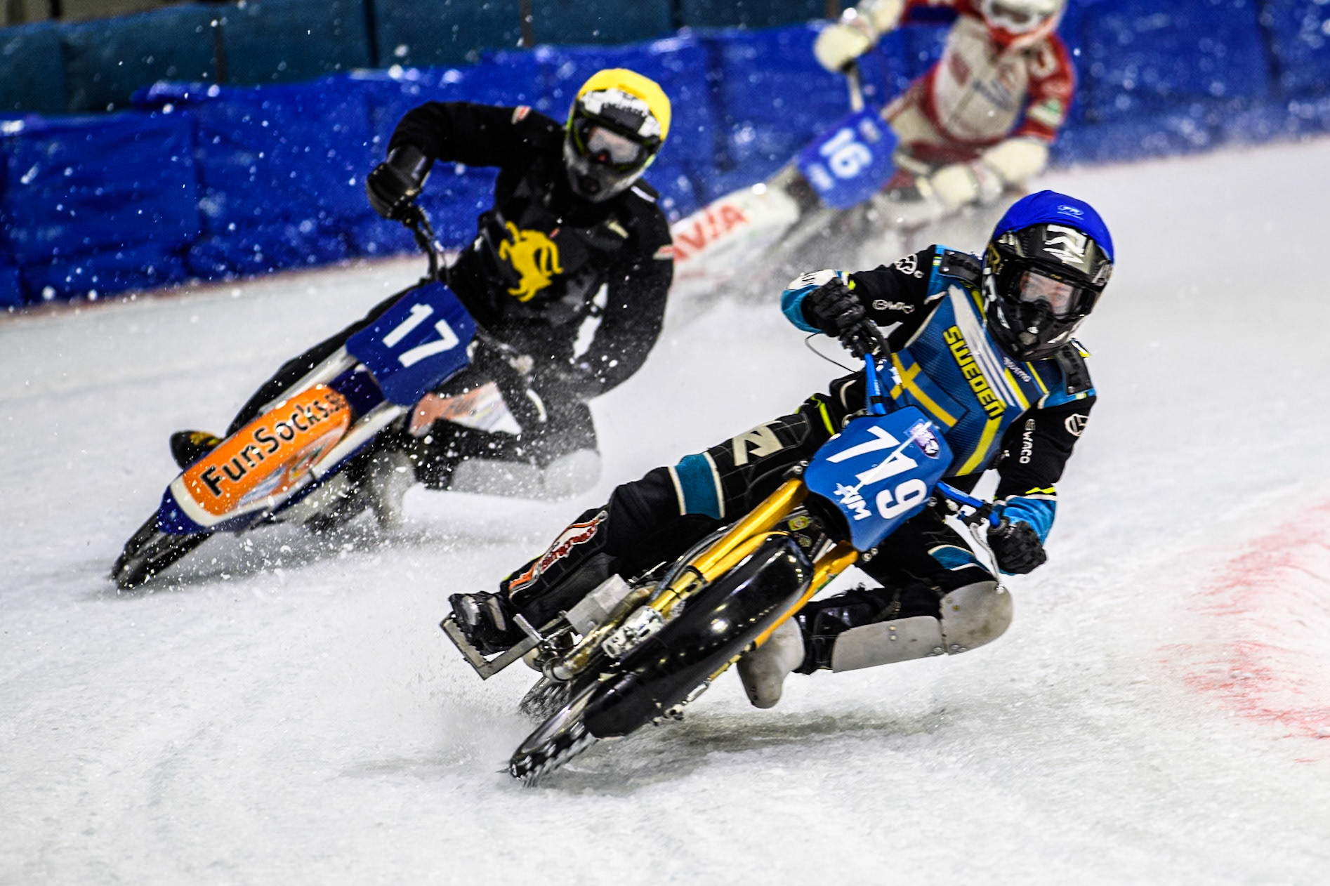 Filip Jäger (719) of Sweden in Blue leading Leon Kramer (17) of The Netherlands in White during the FIM Ice Speedway Gladiators World Championship, Final 4 at the Ice Stadium, Thialf, Heerenveen on Sunday 6th April 2025. (Photo: Ian Charles | MI News)