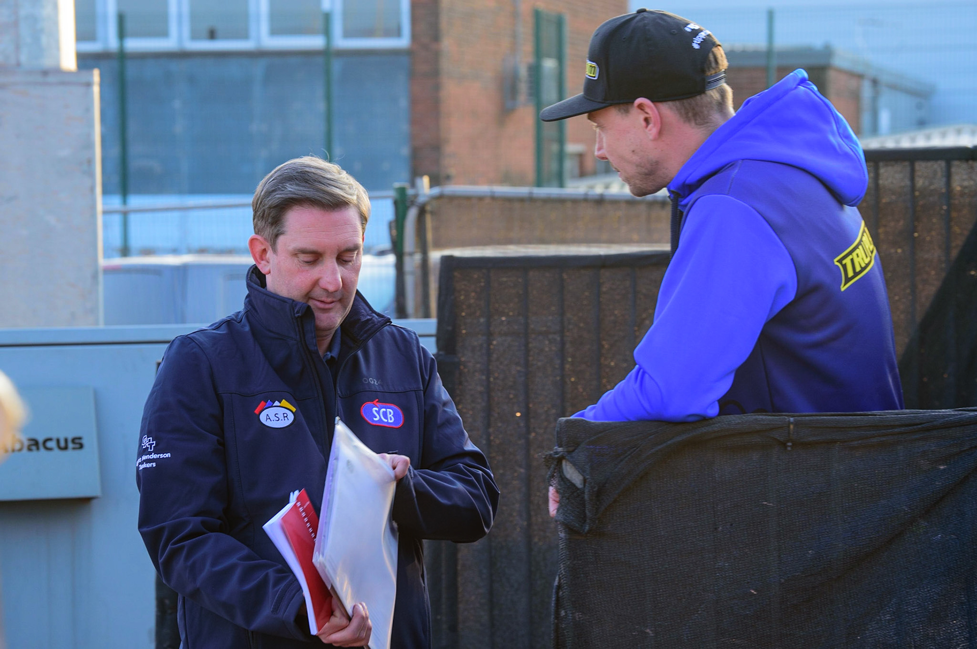 MANCHESTER, UK.  MAR 28TH. Referee Craig Ackroyd (left) chats with Simon Stead, Manger of Sheffield Tigers   during the SGB Premiership League Cup match between Belle Vue Aces and Sheffield Tigers at the National Speedway Stadium, Manchester on Monday 28th March 2022. (Credit: Ian Charles | MI News)