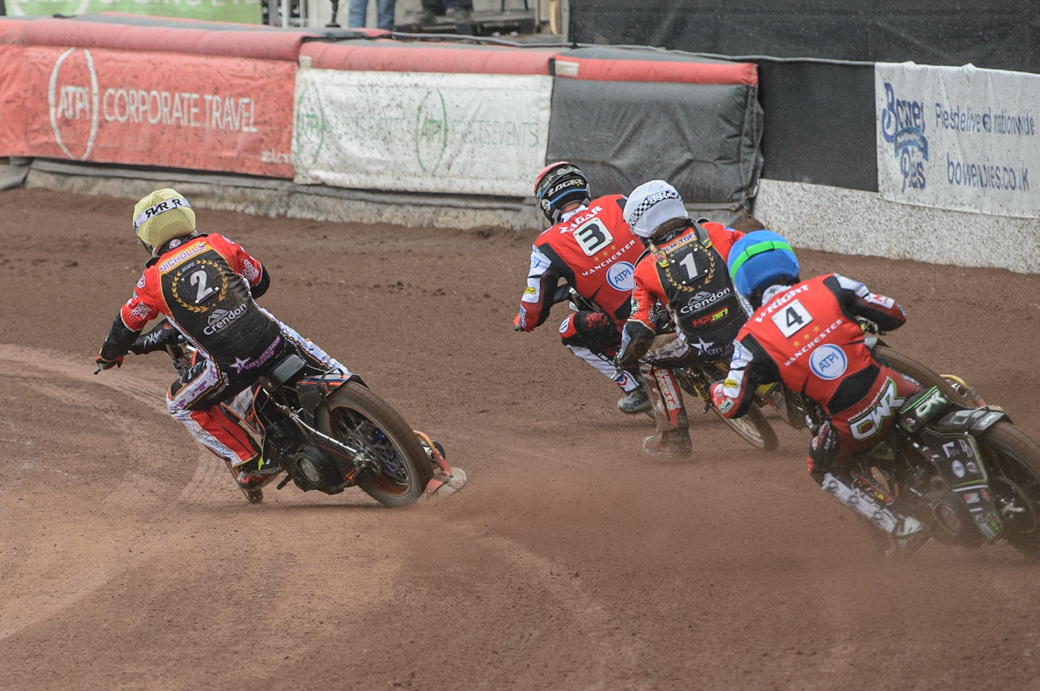 MANCHESTER, UK. MAY 2ND Charles Wright  (Blue) chases Scott Nicholls  (Yellow), Michael Palm Toft  (White) and Matej Žagar  (Red)  during the SGB Premiership match between Belle Vue Aces and Peterborough at the National Speedway Stadium, Manchester on Monday 2nd May 2022. (Credit: Ian Charles | MI News)