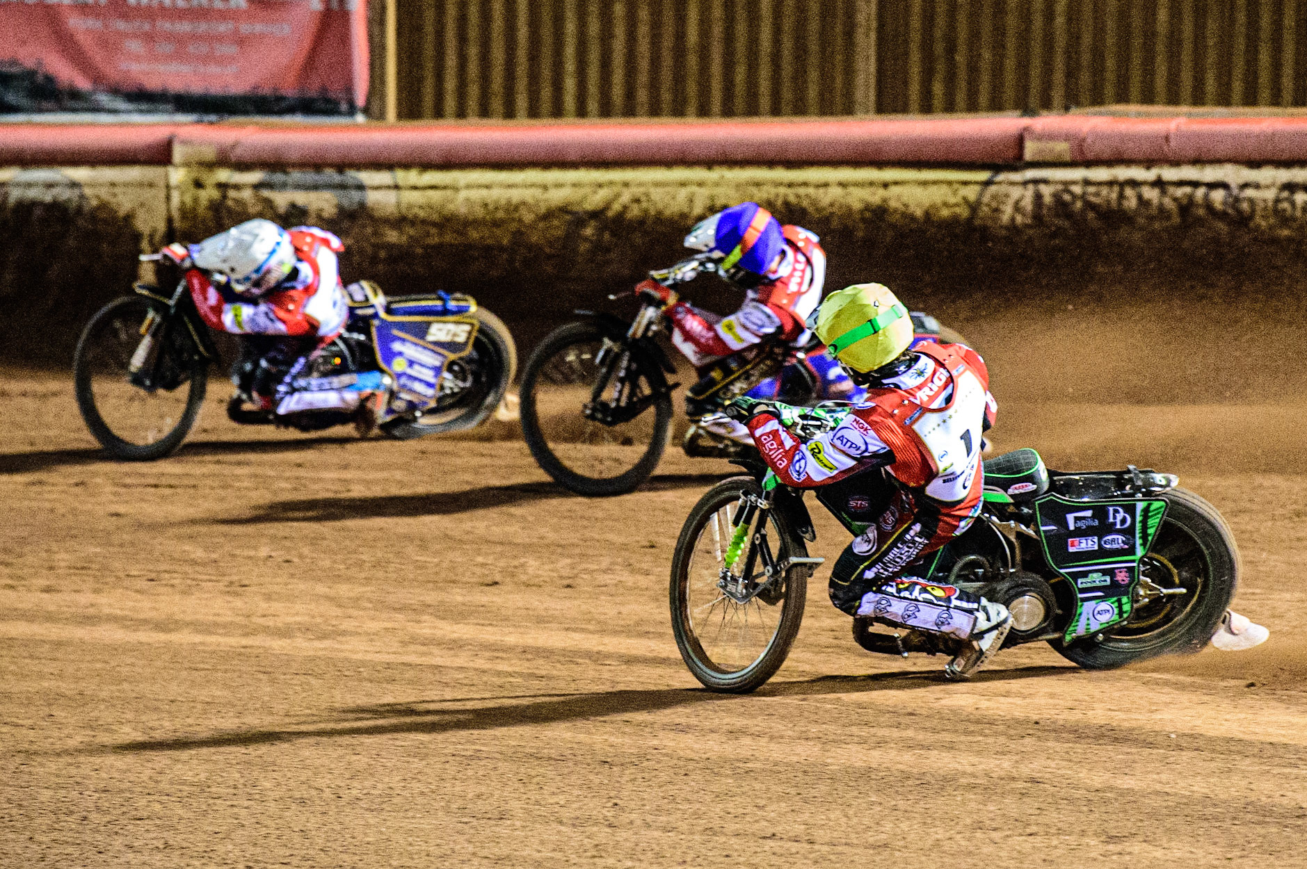Charles Wright  (Yellow) chases Dan Bewley  (Blue) and Robert Lambert  (White) during the Peter Craven Memorial Trophy  at the National Speedway Stadium, Manchester on Monday 3rd April 2023. (Photo: Ian Charles | MI News)