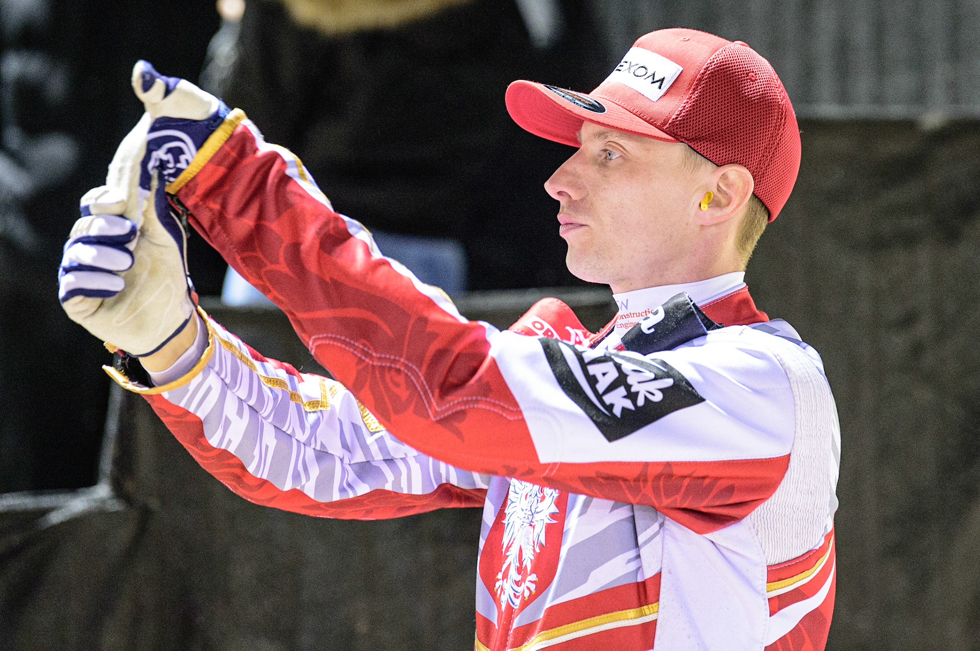 MANCHESTER, UK. MAR 21ST.  Tobiasz Musielak warms up with stretching exercises during the ATPI Peter Craven Memorial Trophy at the National Speedway Stadium, Manchester on Monday 21st March 2022. (Credit: Ian Charles | MI News)