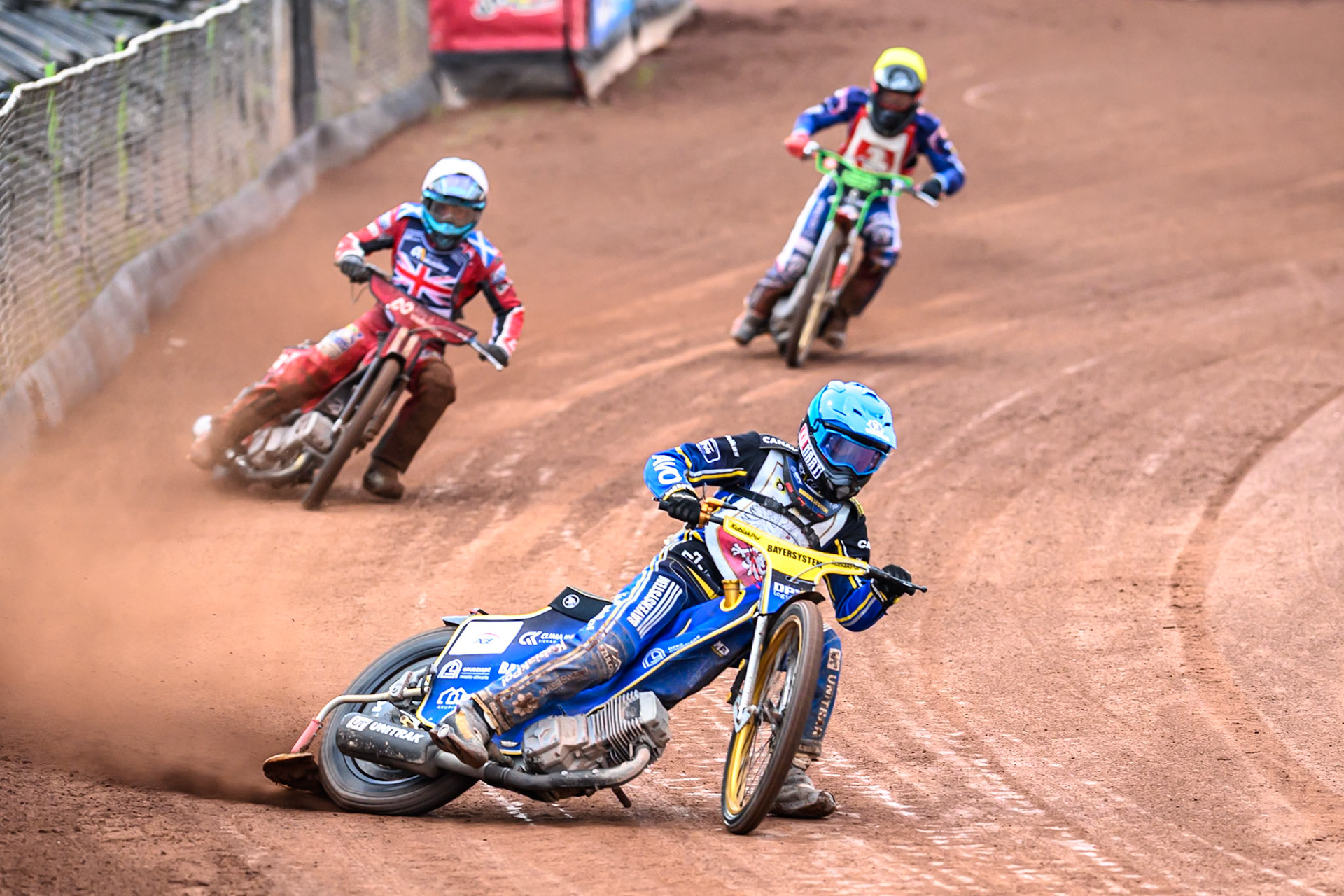 Jan Przanowski of Poland in Blue leading Ashton Boughen of Great Britain in White and Jan Jenicek of Czechia in Yellow during the FIM SGP2 Qualifying Round at the Peugeot Ashfield Stadium in Glasgow on Saturday 24th May 2025. (Photo: Ian Charles | MI News)