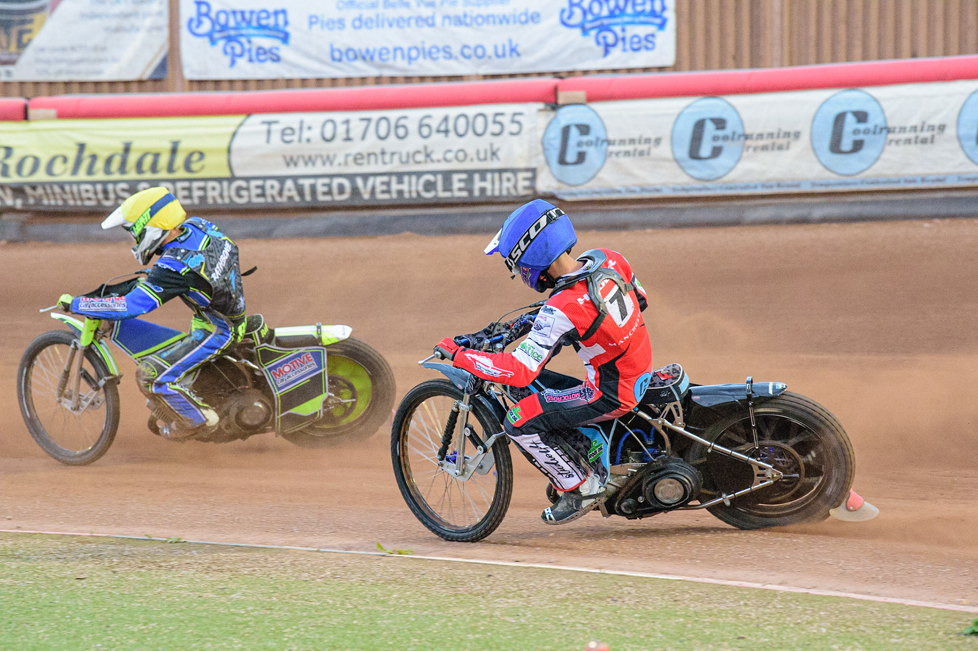 MANCHESTER, UK. JUN 24TH  Freddy Hodder  (Blue) chases Ben Rathbone  (Yellow) during the National Development League match between Belle Vue Colts and Berwick Bullets at the National Speedway Stadium, Manchester on Friday 24th June 2022. (Credit: Ian Charles | MI News)