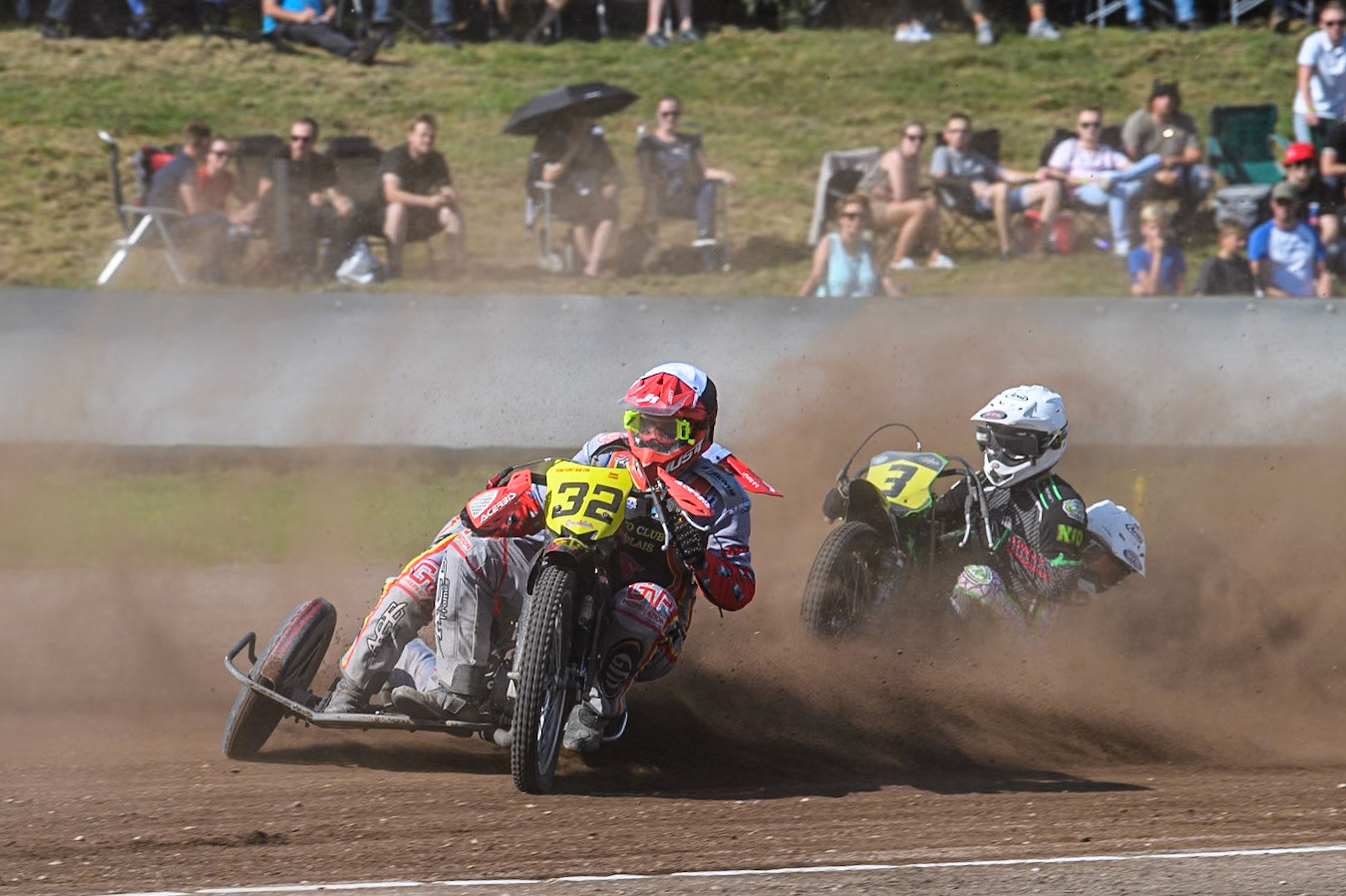 Clement &amp; Romain Furet (32) of France in Black &amp; White leading Josh &amp; Scott Goodwin (3) of Great Britain  in White during the FIM Long Track World Championship Final 5 at the Speed Centre Roden, Roden, Netherlands on Sunday 22nd September 2024. (Photo: Ian Charles | MI News)