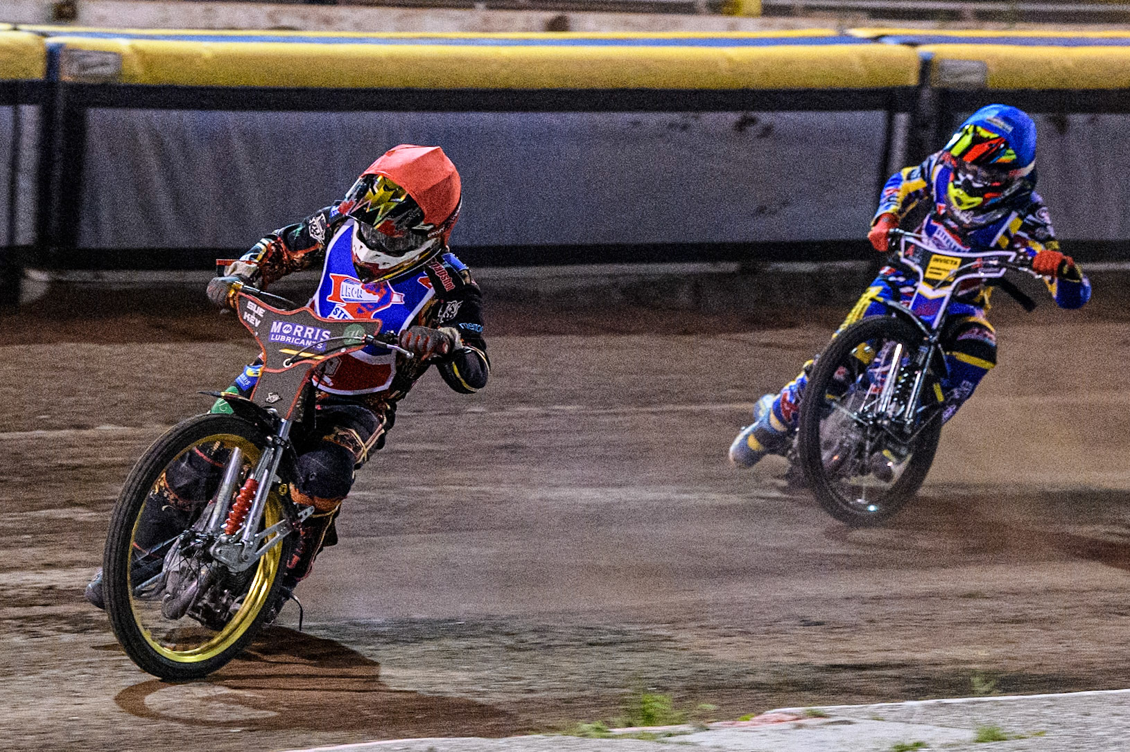 Steelers' Luke Harris in Red leading Steelers' Jamie Etherington in Blue during the WSRA National Development League match between Steelers and Belle Vue Colts at Owlerton Stadium, Sheffield on Monday 5th May 2025. (Photo: Ian Charles | MI News)