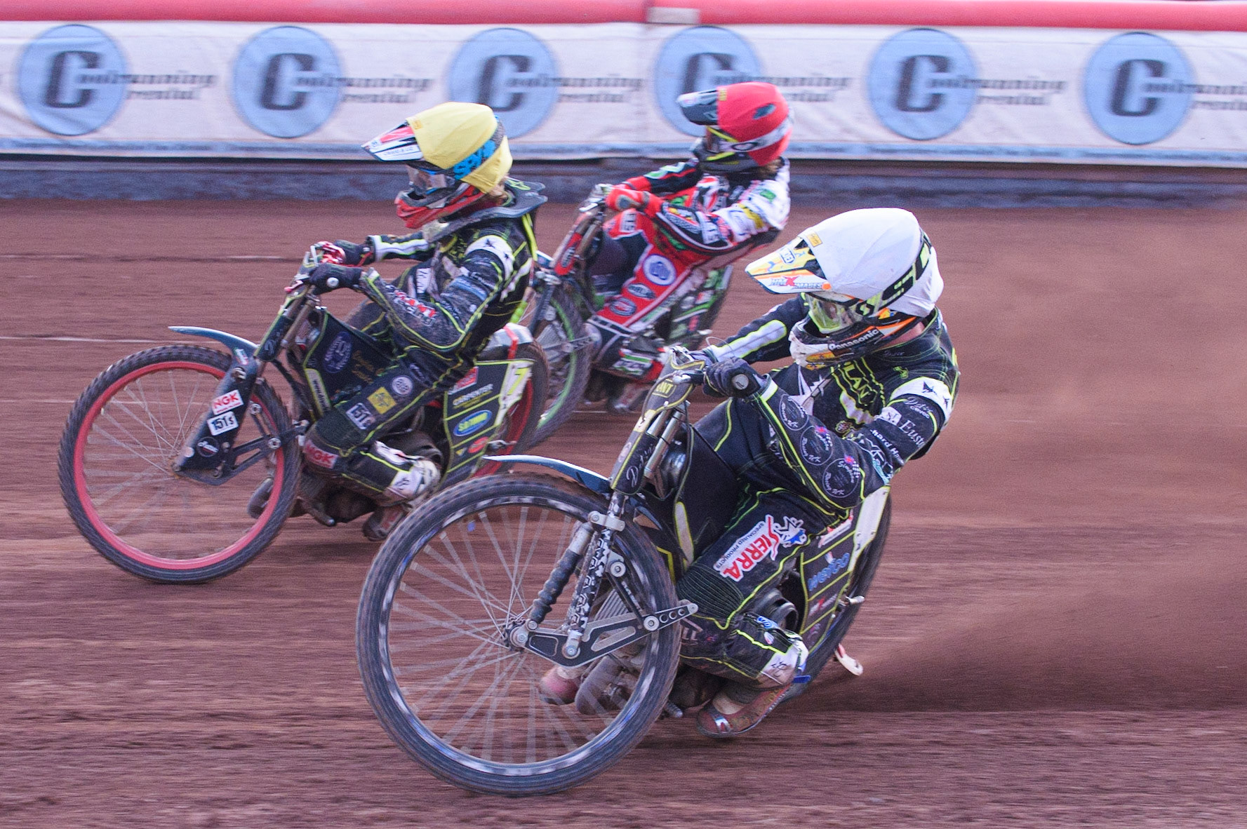 MANCHESTER, UK. JUNE 7TH   Jake Allen  (White) and Drew Kemp  (Yellow) inside Charles Wright  (Blue) during the SGB Premiership match between Belle Vue Aces and Ipswich Witches at the National Speedway Stadium, Manchester on Monday 7th June 2021. (Credit: Ian Charles | MI News)