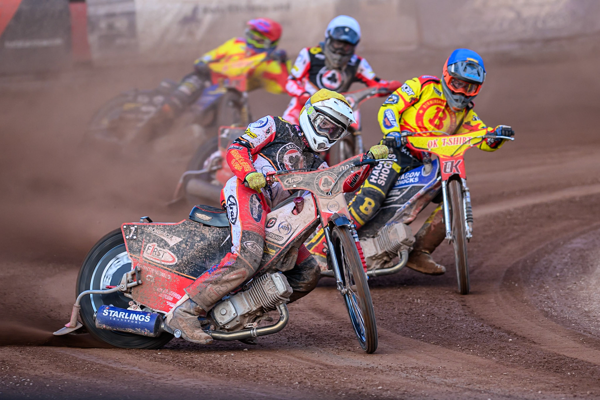 Belle Vue Aces' Jake Mulford in Yellow leading Birmingham Brummies' Jason Edwards in Blue Belle Vue Aces' Norick Blodorn in White and Birmingham Brummies' Paco Castagna in Red during the Rowe Motor Oil Premiership match between Birmingham Brummies and Belle Vue Aces at Perry Bar Stadium, Birmingham on Monday 2nd June 2025. (Photo: Ian Charles | MI News)