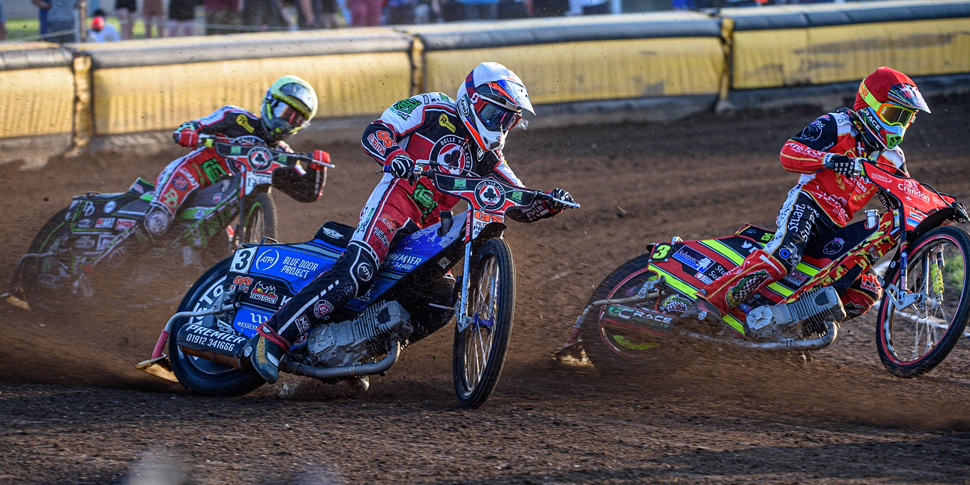PETERBOROUGH, UK. JULY 19TH  Steve Worrall  (White) outside Michael Palm-Toft  (Red) with Charles Wright  (Yellow) behind during the SGB Premiership match between Peterborough and Belle Vue Aces at East of England Showground, Peterborough on Monday 19th July 2021. (Credit: Ian Charles | MI News)