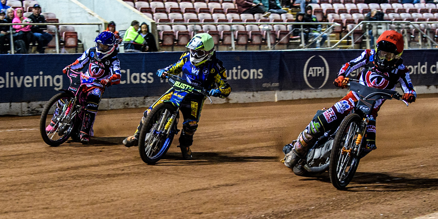Jack Smith  (Red) inside Henry Atkins  (White) and James Pearson (Blue) during the National Development League match between Belle Vue Colts and Oxford Chargers at the National Speedway Stadium, Manchester on Friday 12th May 2023. (Photo: Ian Charles | MI News)