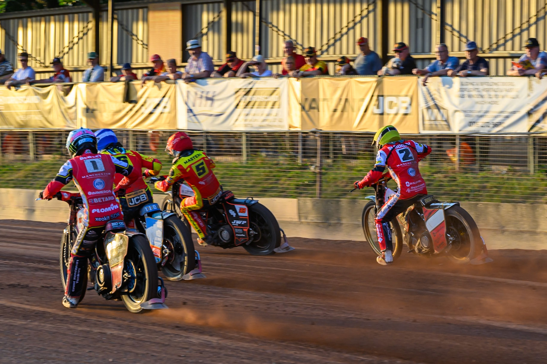 Belle Vue Aces' Dan Bewley in White and Belle Vue Aces' Norick Blodorn in Yellow chases Leicester Lions' Drew Kemp in Blue and Leicester Lions' Sam Masters in Red during the Rowe Motor Oil Premiership match between Leicester Lions and Belle Vue Aces at the Hydroscand Arena, Leicester on Thursday 19th June 2025. (Photo: Ian Charles | MI News)
