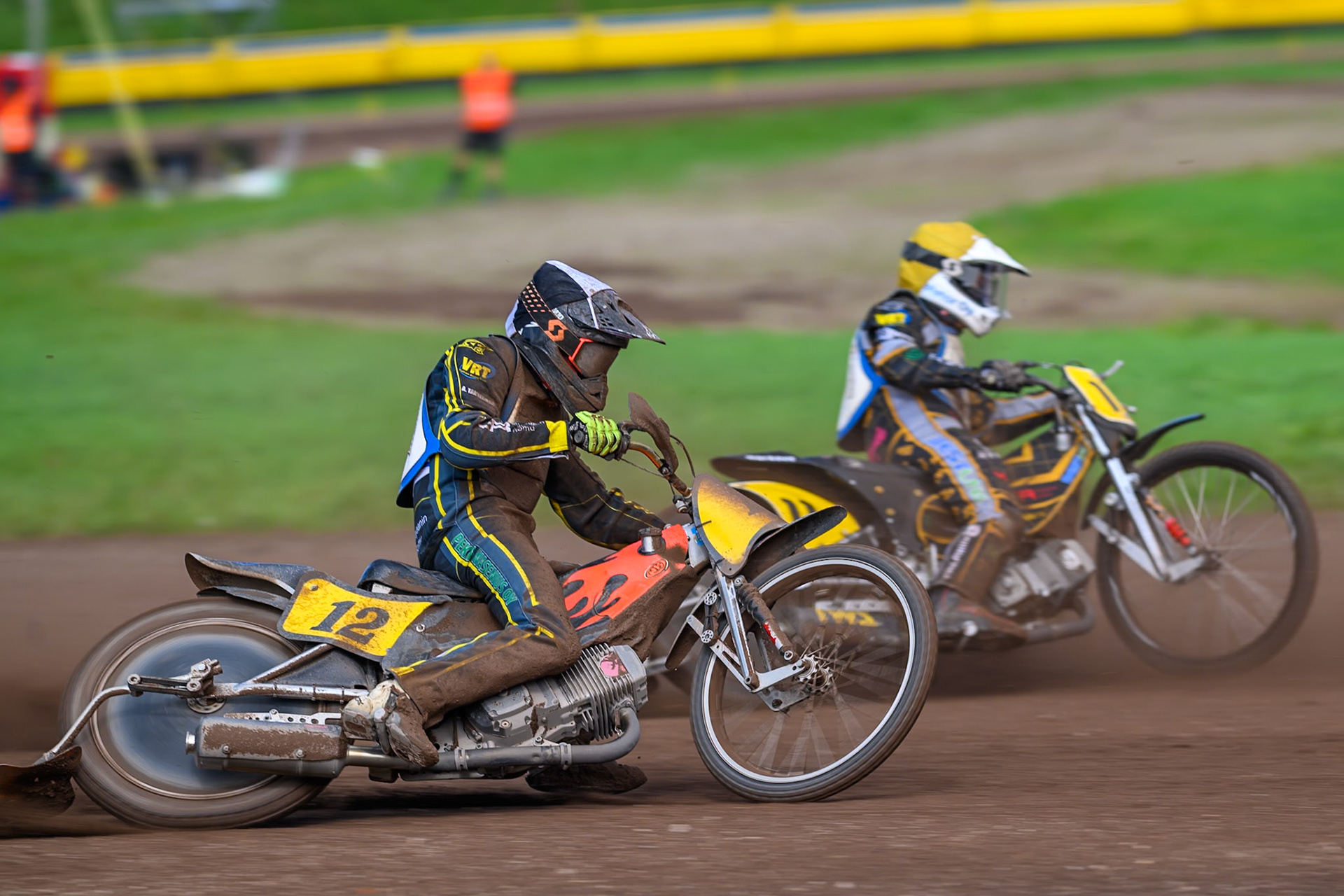 Ossi Rantala (12) of Finland in Black &amp; White on the outside of Jesse Mustonen (11) of Finland in Yellow during the FIM Long Track of Nations 2026 at the Speed Centre Roden in the Netherlands on Sunday 20th September 2026. (Photo: Ian Charles | MI News)