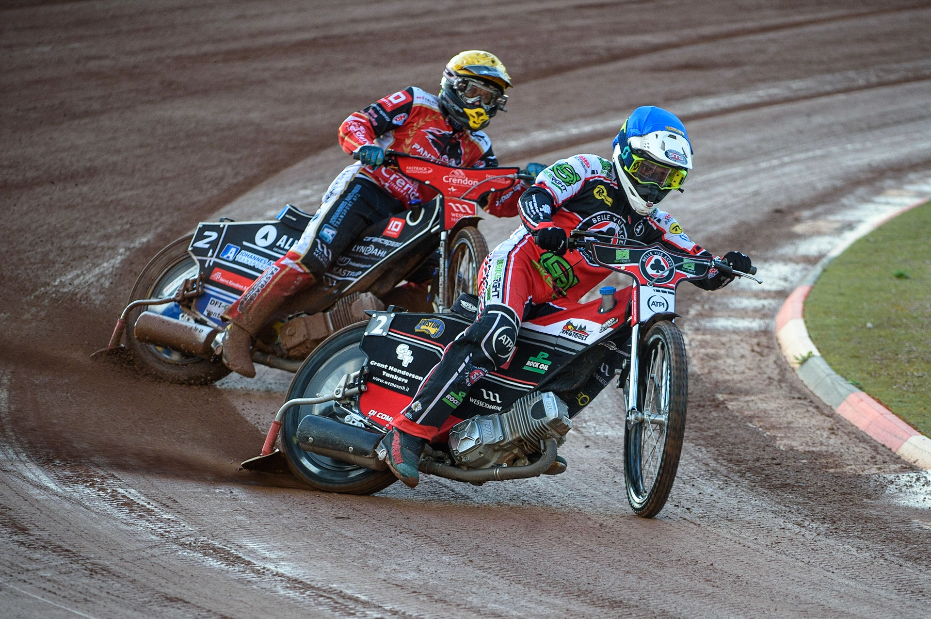 MANCHESTER, UK. AUG 9TH  Richie Worrall  (Blue) leads Bjarne Pedersen  (Yellow) during the SGB Premiership match between Belle Vue Aces and Peterborough at the National Speedway Stadium, Manchester on Monday 9th August 2021. (Credit: Ian Charles | MI News)