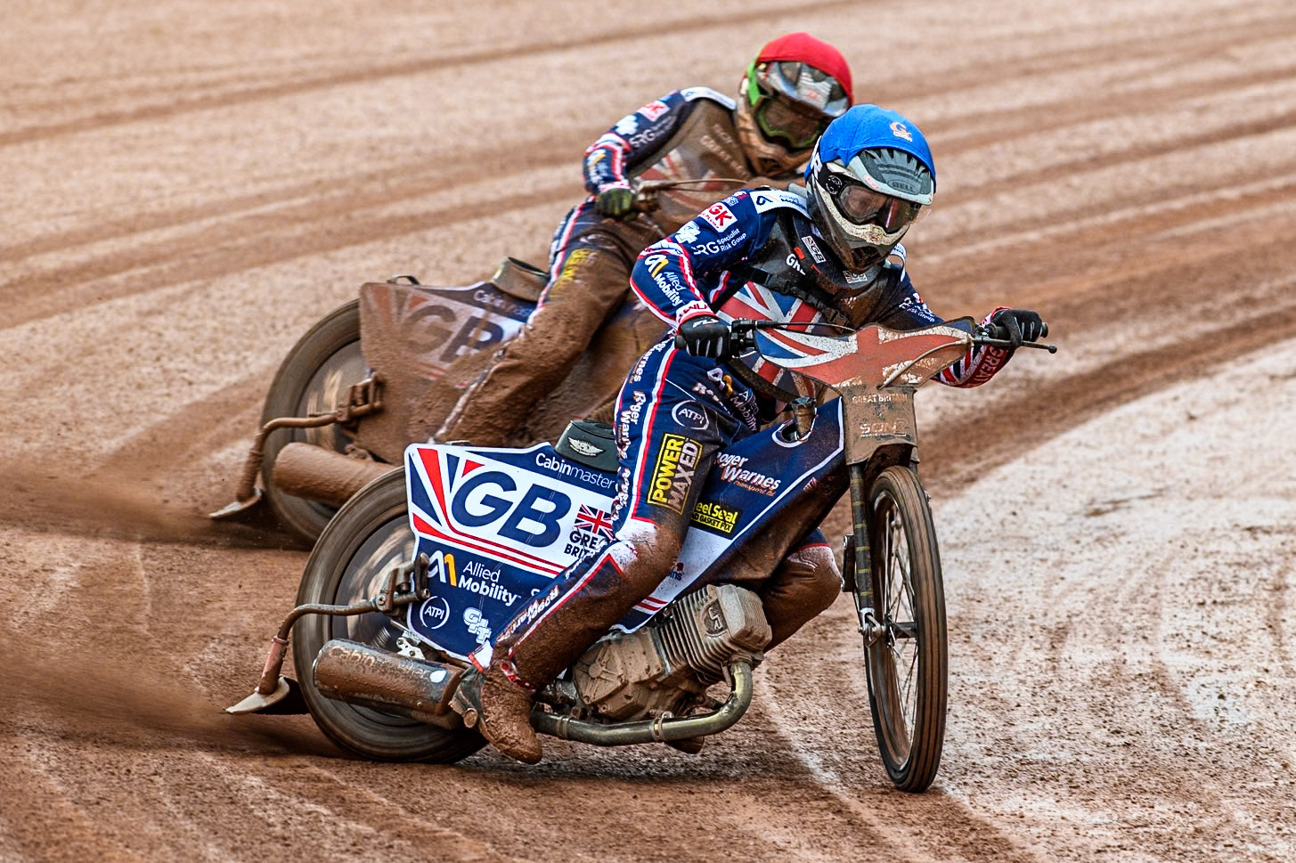 Dan Thompson of Great Britain in Blue leading team mate Leon Flint during the Monster Energy FIM Speedway of Nations 2 (Under 21) Final at the National Speedway Stadium, Manchester on Friday 12th July 2024. (Photo: Ian Charles | MI News)