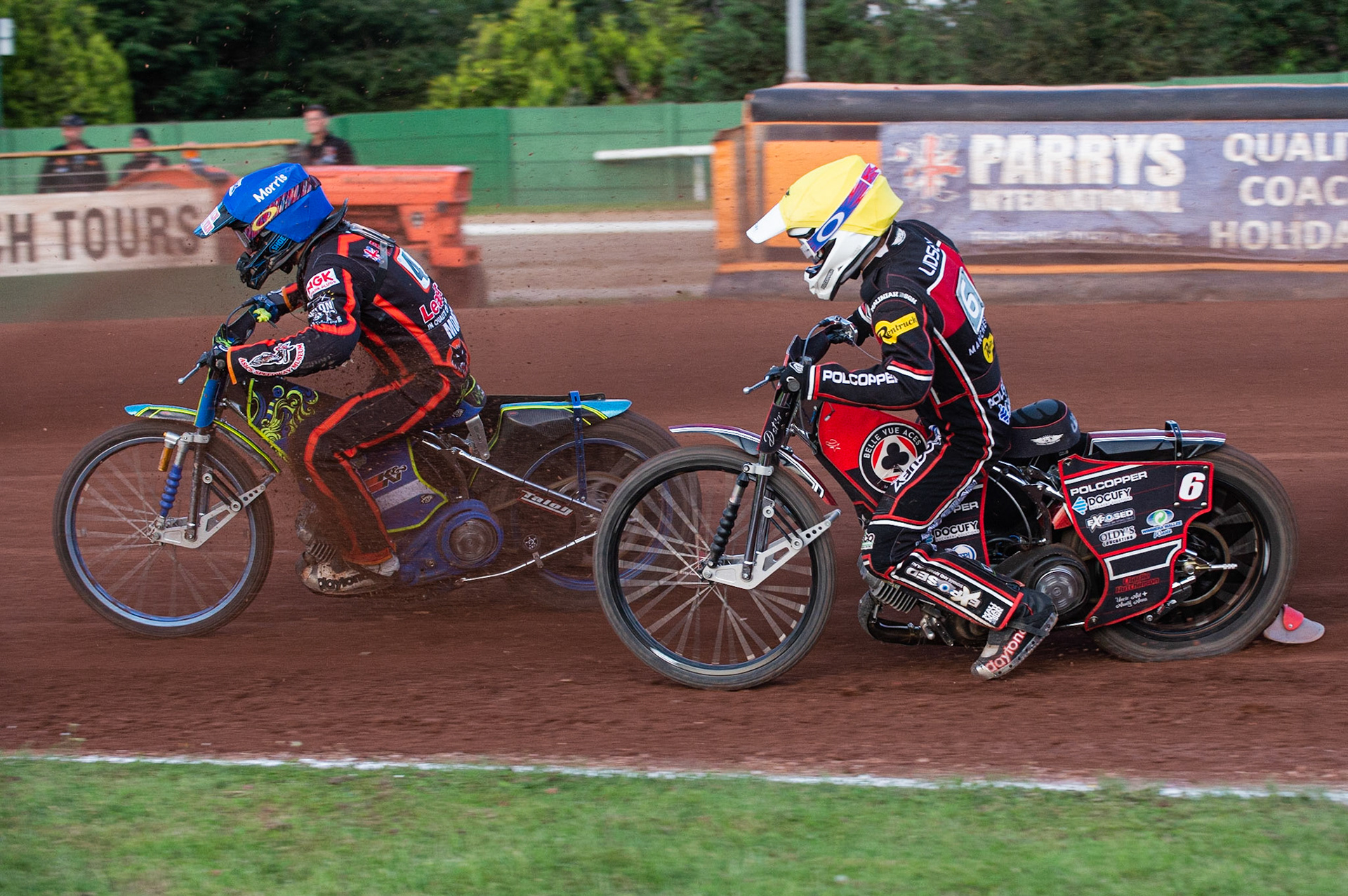Photo by Ian Charles:

Nick Morris  (Blue) is chased by Jaimon Lidsey (Yellow)

Wolverhampton Wolves v Belle Vue Aces, British Speedway Premiership 5 August 2019