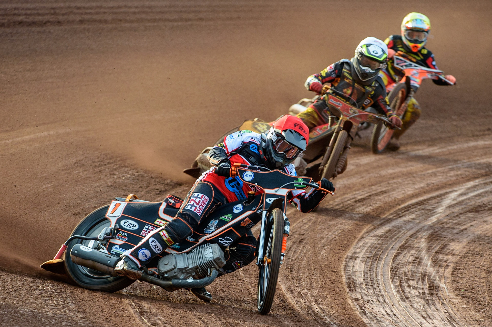 MANCHESTER, UK. JULY 29TH  Jack Smith  (Red) leads Dan Thompson  (White) and Ben Trigger  (Yellow)  during the National Development League match between Belle Vue Colts and Leicester Lion Cubs at the National Speedway Stadium, Manchester on Thursday 29th July 2021. (Credit: Ian Charles | MI News)