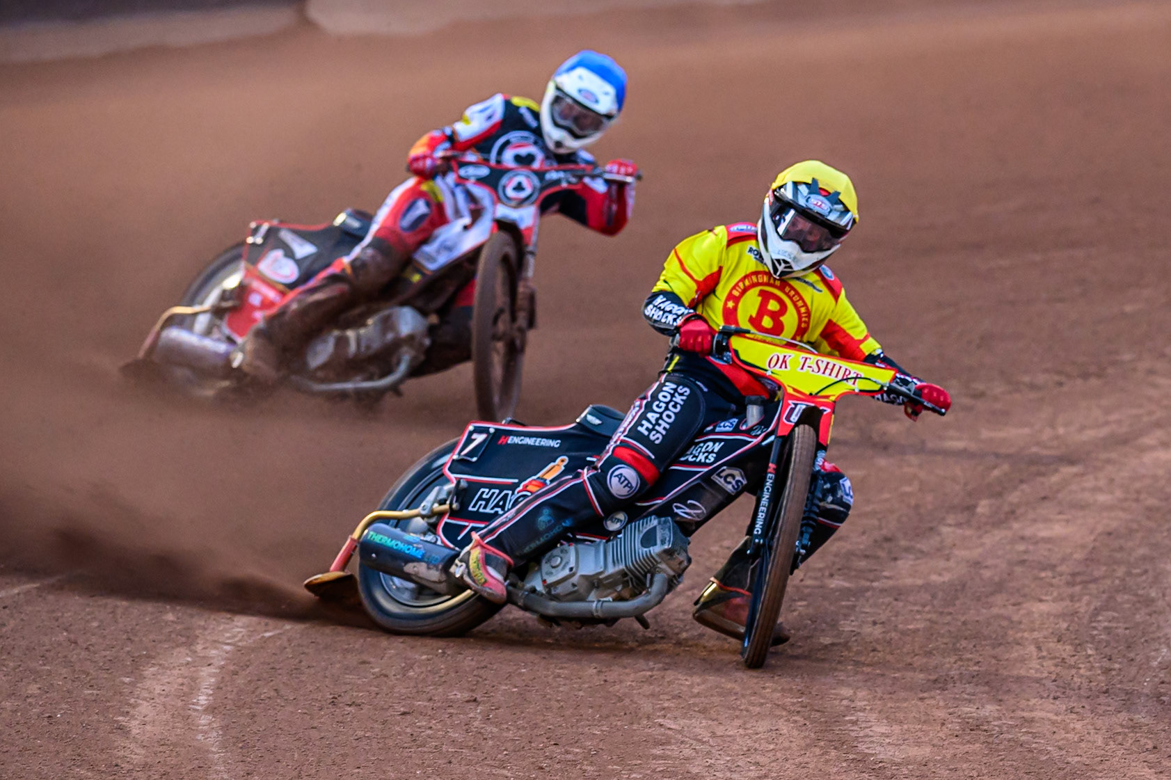 Sam Hagon of Birmingham Brummies in Yellow leading Jake Mulford of Belle Vue Aces  in Blue during the Rowe Motor Oil Premiership match between Belle Vue Aces and Birmingham Brummies at the National Speedway Stadium, Manchester on Monday 18th August 2025. (Photo: Ian Charles | MI News)