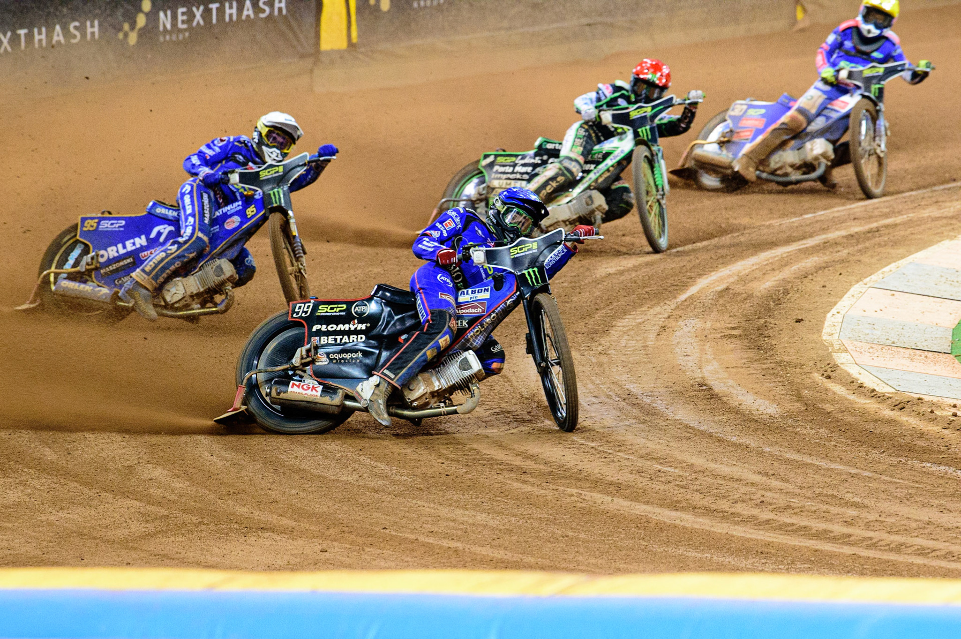 The Grand Final: Dan Bewley (99) (Blue) leads Bartosz Zmarzlik (95) (White) Patryk Dudek (692) (Red) and Leon Madsen (30) (Yellow) during the FIM  Speedway Grand Prix of Great Britain at the Principality Stadium, Cardiff on Saturday 13th August 2022. (Credit: Ian Charles | MI News