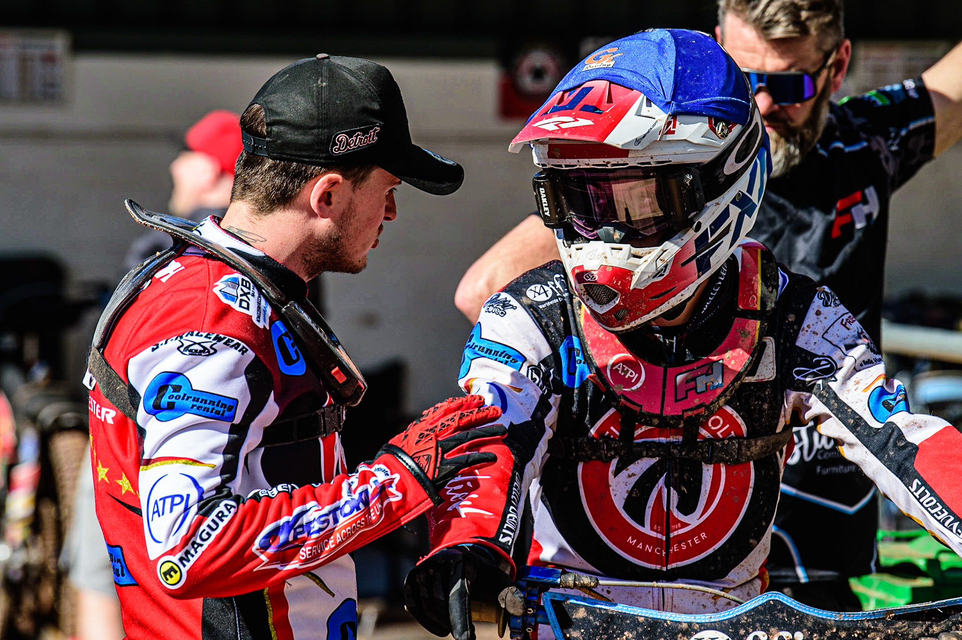 Jack Smith  (left) passes on some advice to Freddy Hodder  during the National Development League match between Belle Vue Colts and Berwick Bullets at the National Speedway Stadium, Manchester on Friday 7th April 2023. (Photo: Ian Charles | MI News)