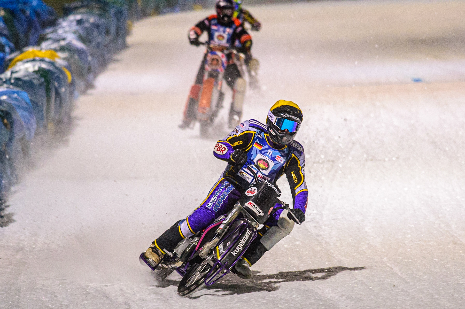 Christoph Kirchner (Yellow) leads Sebastian Reitsma (White) during the German Individual Ice Speedway Championship at Horst-Dohm-Eisstadion, Berlin on Friday 3rd March 2023. (Photo: Ian Charles | MI News)