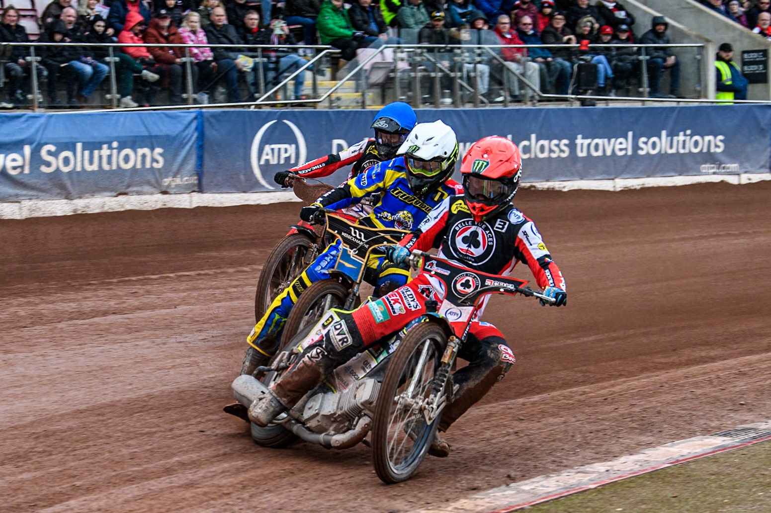 Belle Vue ATPI Aces Brady Kurtz (Red) leads  Sheffield Tigers' Jack Holder (White) and Belle Vue ATPI Aces Jaimon Lidsey (Blue) during the Rowe Motor Oil Premiership KO Cup Quarter Final 1st Leg between Belle Vue Aces and Sheffield Tigers at the National Speedway Stadium, Manchester on Monday 1st April 2024. (Photo: Ian Charles | MI News)