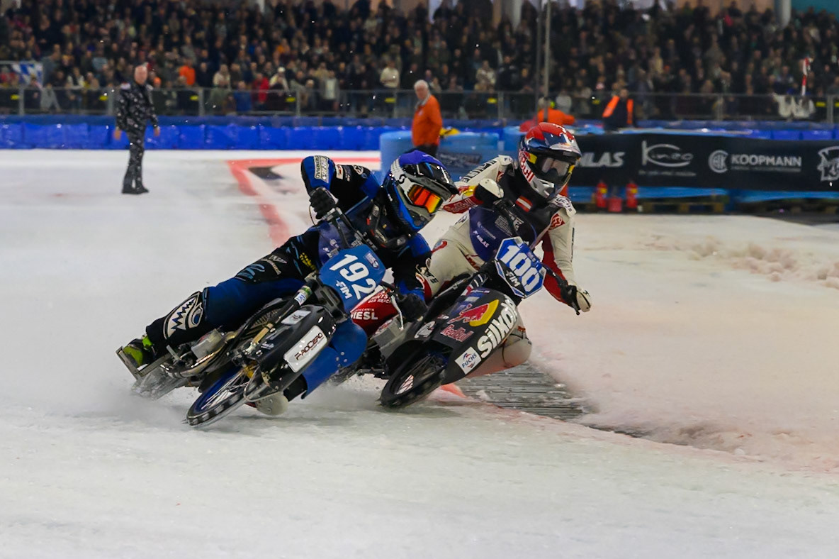 Franz Zorn (100) of Austria in Red rides inside Niclas Svensson (192) of Sweden  in Blue during the FIM Ice Speedway Gladiators World Championship Final 3 at Ice Rink Thialf, Heerenveen on Saturday 11th April 2026. (Photo: Ian Charles | MI News)