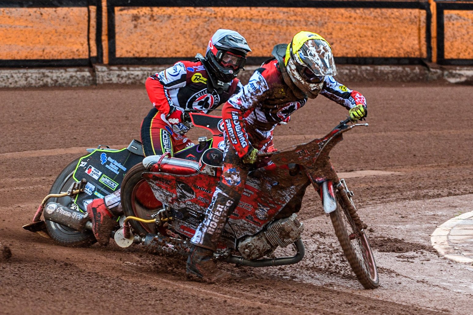 Connor Bailey (Yellow) locks up and falls ahead of team mate Tom Brennan (White) during the Sports Insure Premiership match between Wolverhampton Wolves and Belle Vue Aces at Monmore Green Stadium, Wolverhampton on Monday 10th July 2023. (Photo: Ian Charles | MI News)