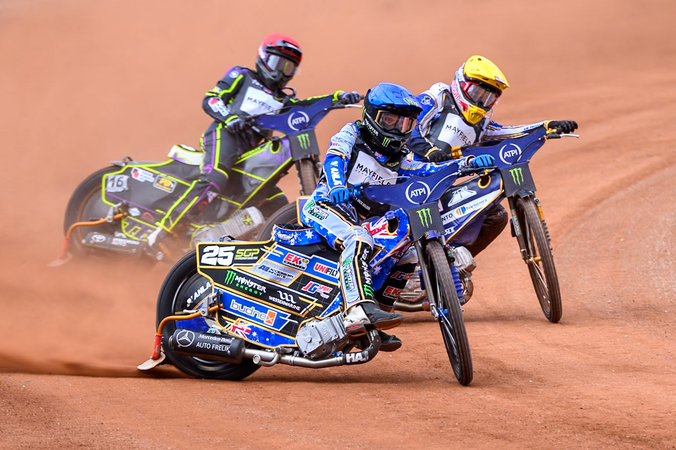 Jack Holder (25) of Australia in Blue leading Robert Lambert (505) of Great Britain in Yellow and Wild Card Tom Brennan (16) of Great Britain in Red in the Sprint Race during the ATPI  FIM Speedway GP of Manchester at the National Speedway Stadium, Manchester on Friday 5th June 2026. (Photo: Ian Charles | MI News)
