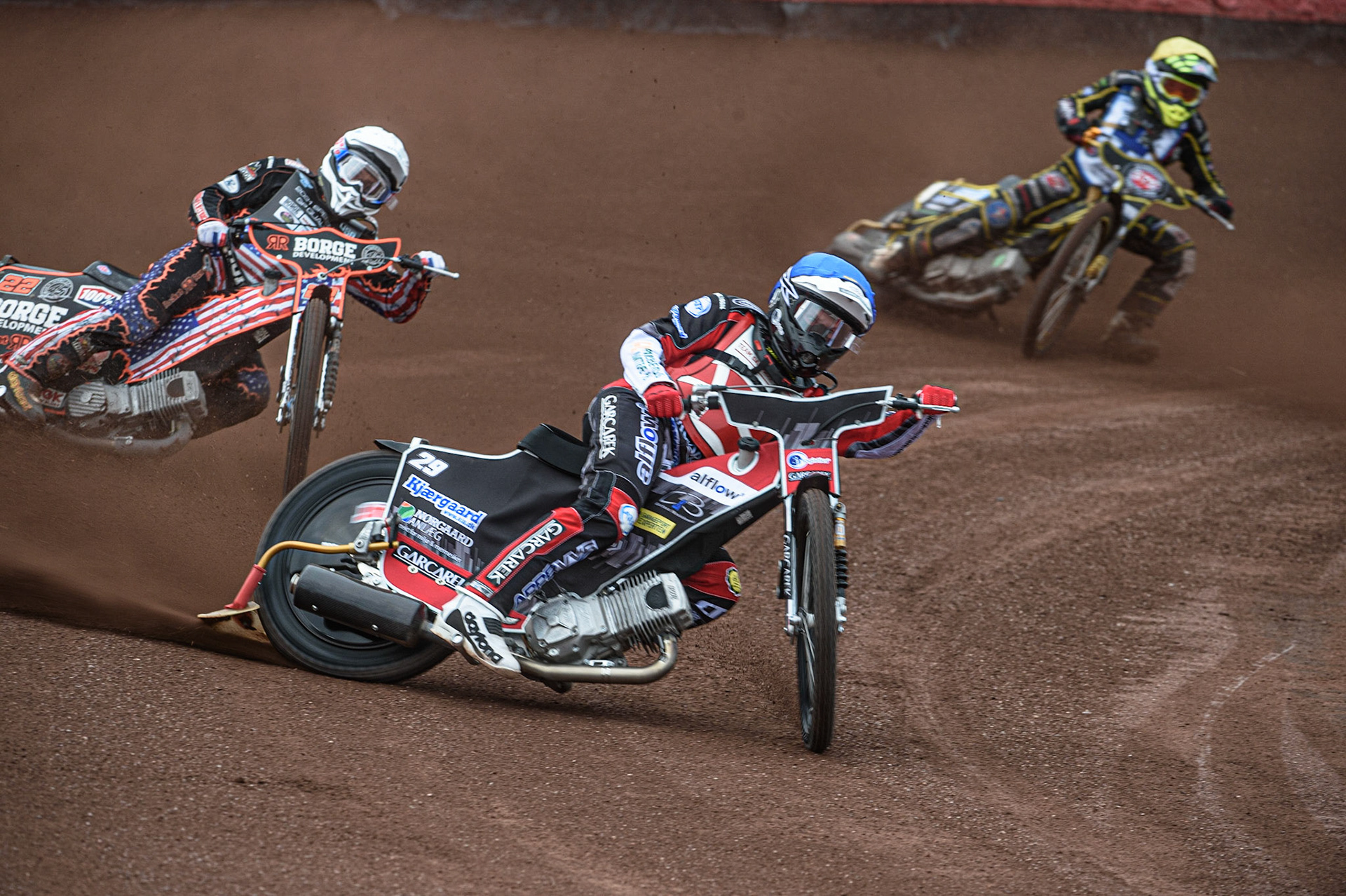 GLASGOW, UK. JUNE 19TH.  Nicolai Klindt (Denmark) (Blue) leads Luke Becker (USA) (White) and Tero Aarnio (Finland) (Yellow) during the FIM Speedway Grand Prix Qualifying Round at the Peugeot Ashfield Stadium, Glasgow on Saturday 19th June 2021. (Credit: Ian Charles | MI News)