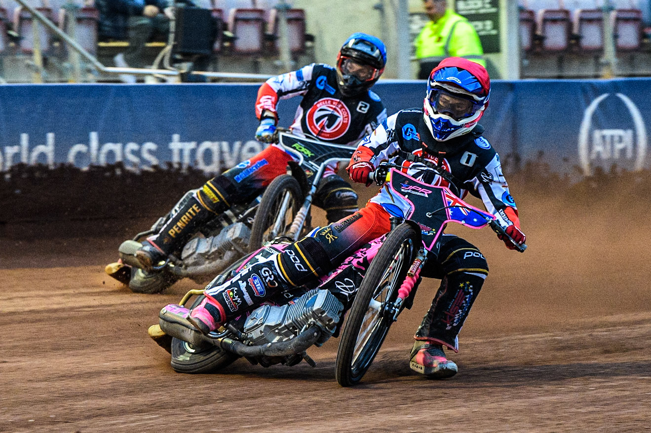 James Pearson (Red) leads team mate Matt Marson (Blue) during the National Development League match between Belle Vue Colts and Edinburgh Monarchs Academy at the National Speedway Stadium, Manchester on Friday 21st July 2023. (Photo: Ian Charles | MI News)