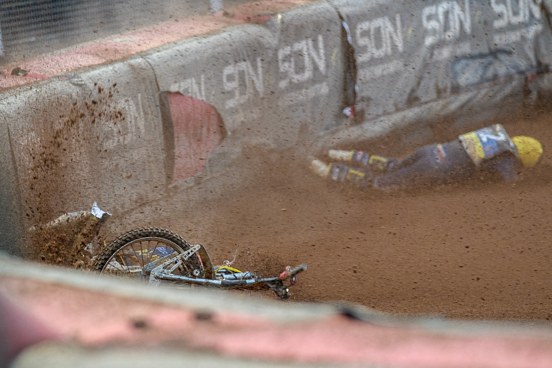 Marko Levishyn of Ukraine in Yellow crashes out of his final heat during the Monster Energy FIM Speedway of Nations Semi-Final 1 at the National Speedway Stadium, Manchester on Tuesday 9th July 2024. (Photo: Ian Charles | MI News)