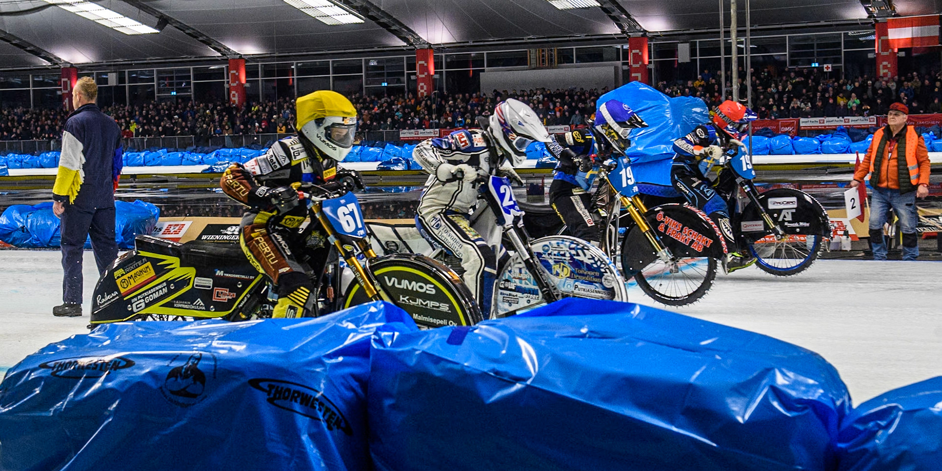 The start of the final: (L to R) Heikki Huusko (67) of Finland in Yellow, Max Koivula (24) of Finland in White, Martin Haarahiltunen (199) of Sweden in Blue and Niclas Svensson (192) of Sweden in Red during the Ice Speedway Gladiators World Championship Final 1 at Max-Aicher-Arena, Inzell on Saturday 15th March 2025. (Photo: Ian Charles | MI News)