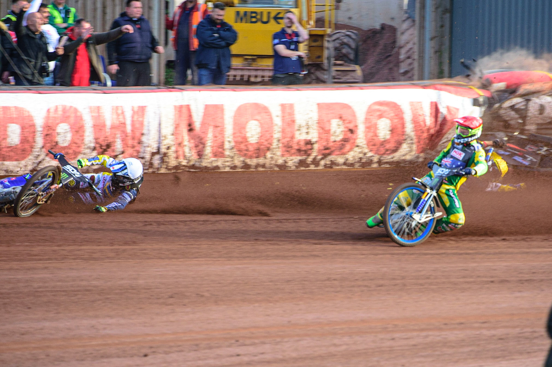 MANCHESTER, UK. OCT 16TH Pontus Aspgren of Sweden (White) slides off as Jacob Thorsell of Sweden hits the airfence during the Monster Energy FIM Speedway of Nations at the National Speedway Stadium, Manchester on Saturday  16th October 2021. (Credit: Ian Charles | MI News)