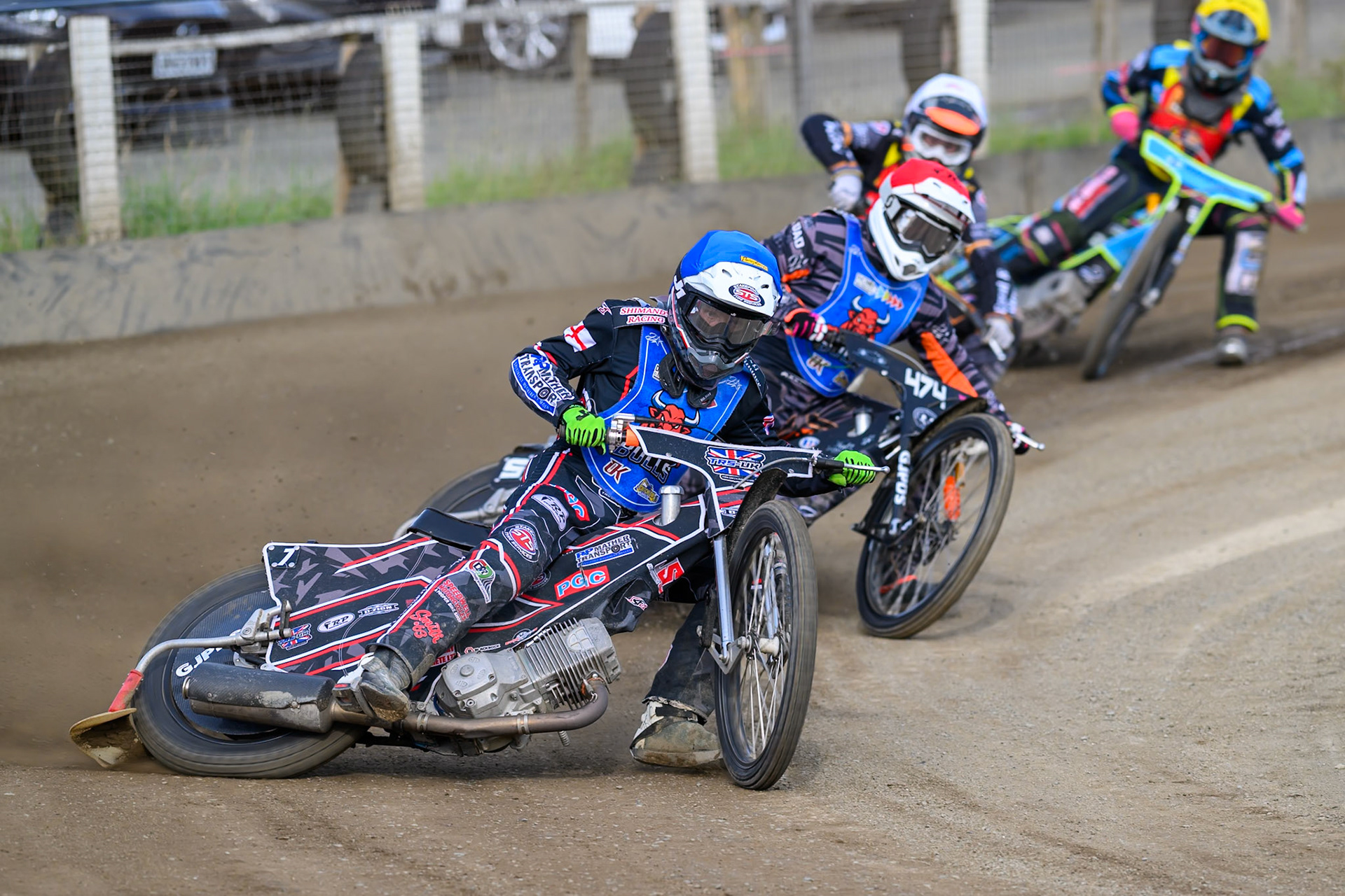 Jack Shimelt of Buxton Bulls  in Blue leading Jack Roberts of Buxton Bulls   in Red , Ryan Ingram of Leicester Lion Cubs   in White  and Eli Meadows  of Leicester Lion Cubs  in Yellow during the WSRA National Development League match between Buxton Bulls and Leicester Lion Cubs at Hi-Edge Speedway, Buxton on Sunday 4th October 2026. (Photo: Ian Charles | MI News)