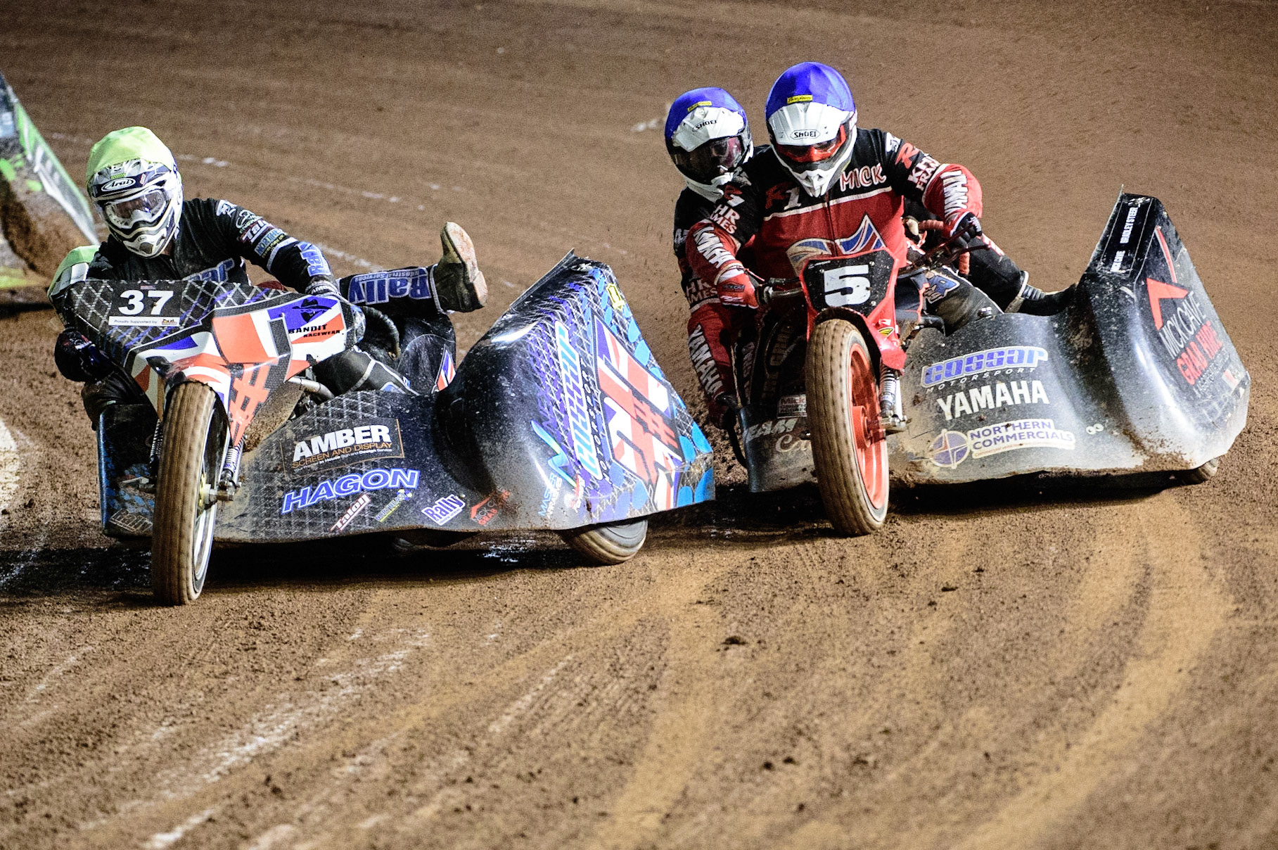 MANCHESTER, UK. OCT 30TH   Mark Cossar &amp; Gareth Williams  (Yellow) forces his way past Mick Cave &amp; Bradley Steer  (Blue) during the Manchester Masters Sidecar Speedway and Flat Track Racing at the National Speedway Stadium, Manchester on Saturday 30th October 2021. (Credit: Ian Charles | MI News)