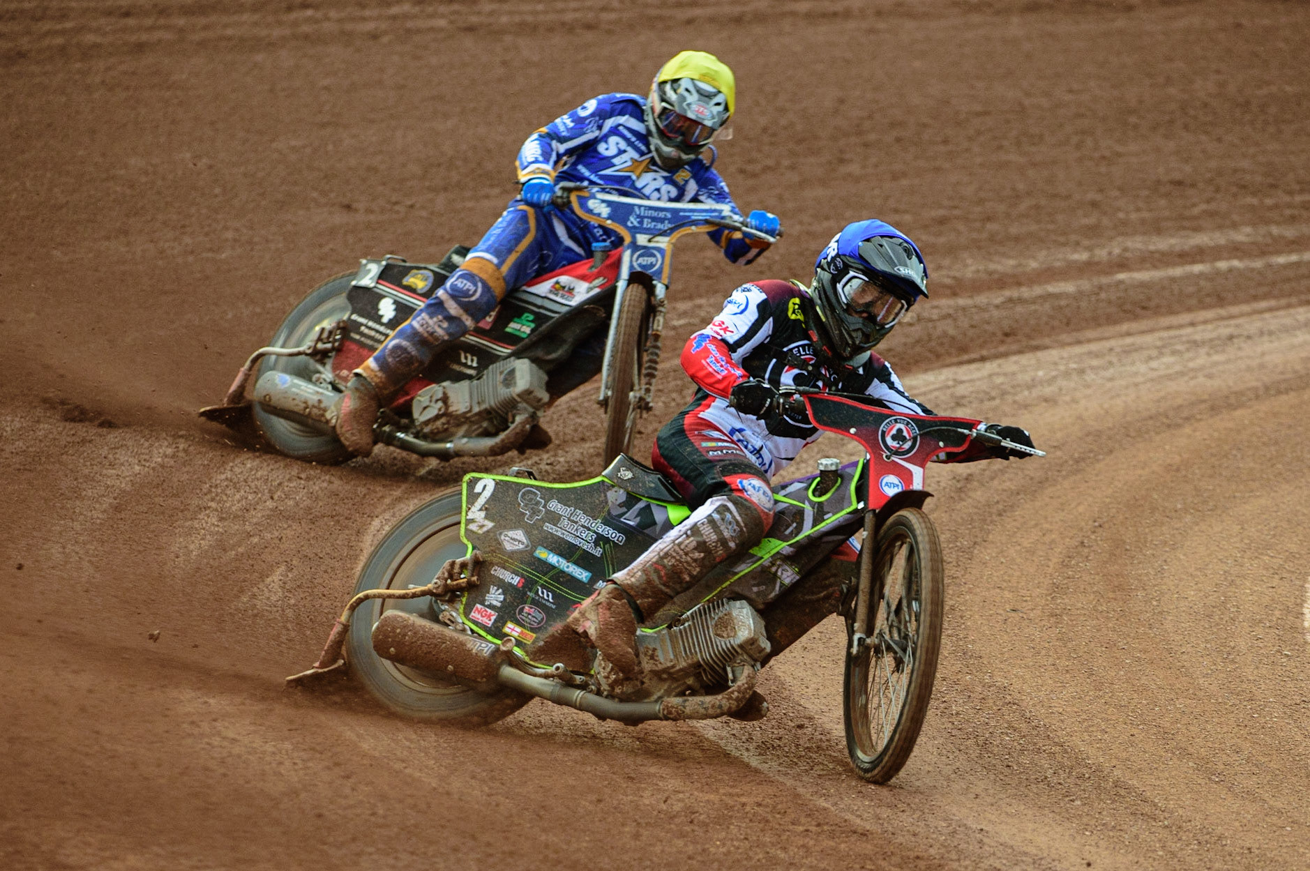 MANCHESTER UK  Tom Brennan  (Blue) leads Richie Worrall  (Yellow) during the SGB Premiership match between Belle Vue Aces and King's Lynn Stars at the National Speedway Stadium, Manchester on Monday 11th July 2022. (Credit: Ian Charles | MI News)