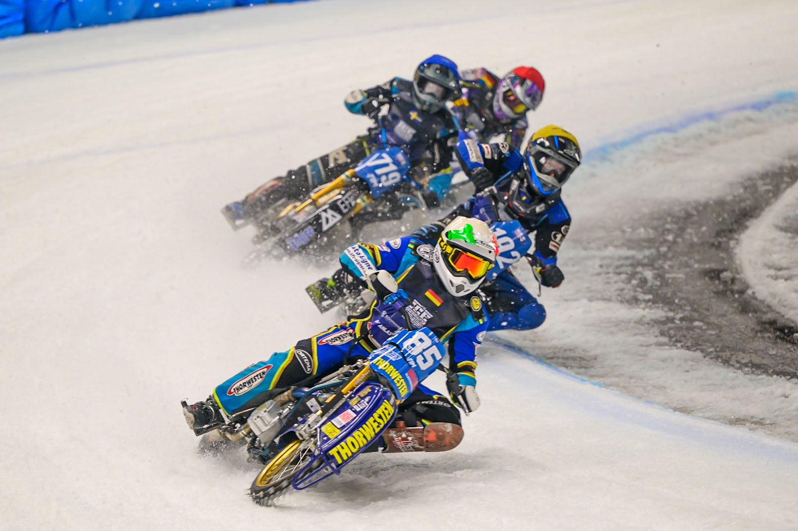Luca Bauer (85) of Italy/Germany  in White leading Niclas Svensson (192) of Sweden  in Yellow Filip Jäger (719) of Sweden  in Blue and Wild Card Maximillian Niedermaier of Germany  in Red during the Ice Speedway Gladiators World Championship Final 1 at Max-Aicher-Arena, Inzell on Saturday 14th March 2026. (Photo: Ian Charles | MI News)