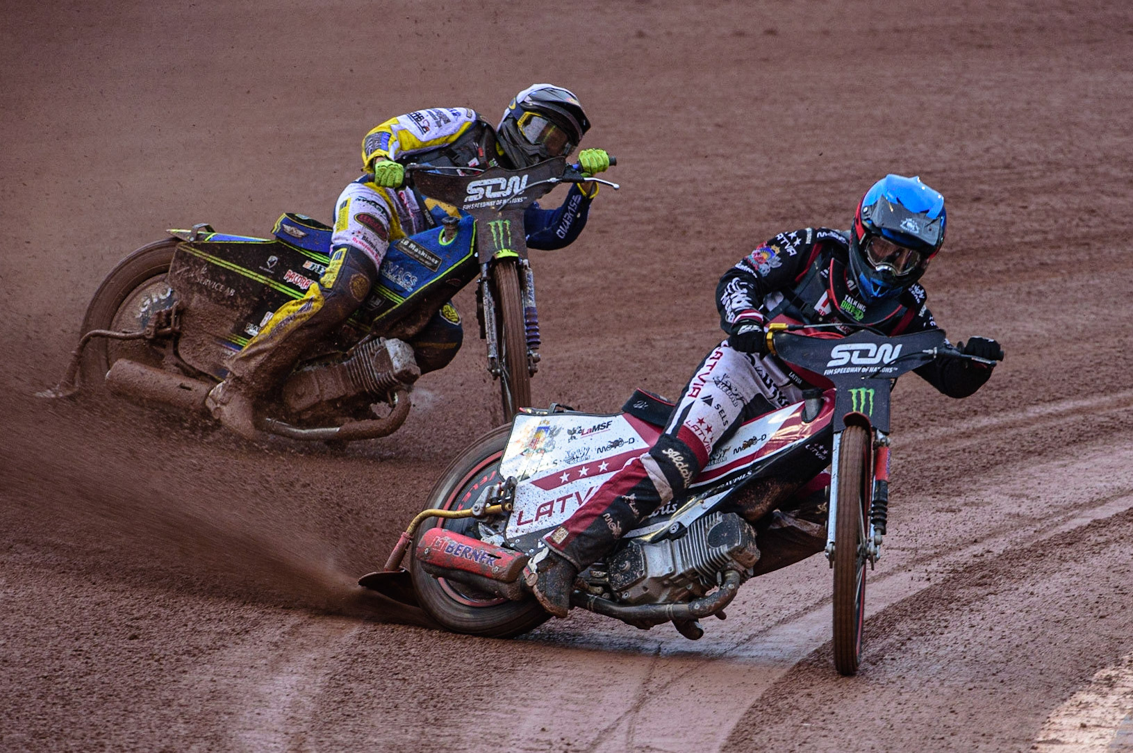 MANCHESTER, UK. OCT 17TH Olegs Mijailovs of Latvia (Blue) leads Philip Hellström-Bangs of Sweden (White) during the Monster Energy FIM Speedway of Nations at the National Speedway Stadium, Manchester on Sunday  17th October 2021. (Credit: Ian Charles | MI News)