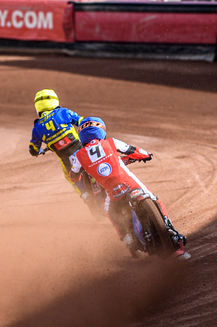 Belle Vue Aces' Ben Cook  in Blue chases Sheffield Tigers' Josh Pickering  in Yellow during the Rowe Motor Oil Premiership match between Belle Vue Aces and Sheffield Tigers at the National Speedway Stadium, Manchester on Monday 26th August 2024. (Photo: Ian Charles | MI News)