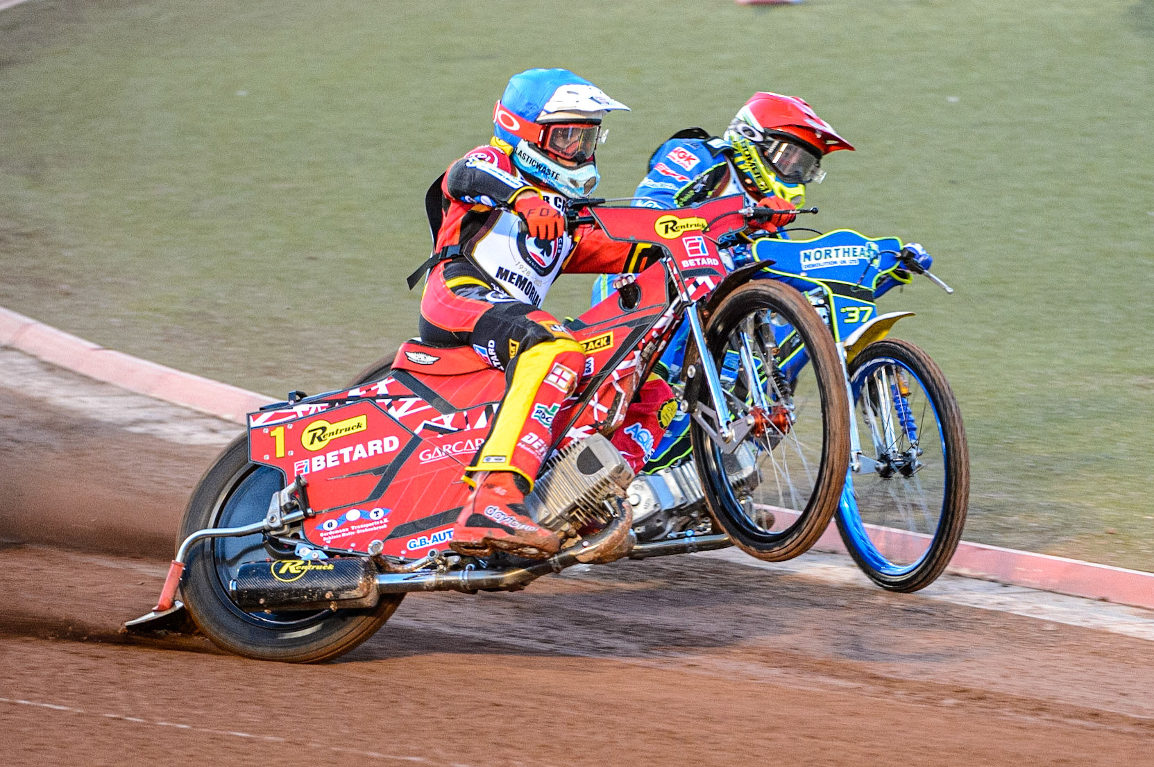 Max Fricke  (Blue) picks up some drive outside Chris Harris (Red)  during the Peter Craven Memorial Trophy  at the National Speedway Stadium, Manchester on Monday 3rd April 2023. (Photo: Ian Charles | MI News)
