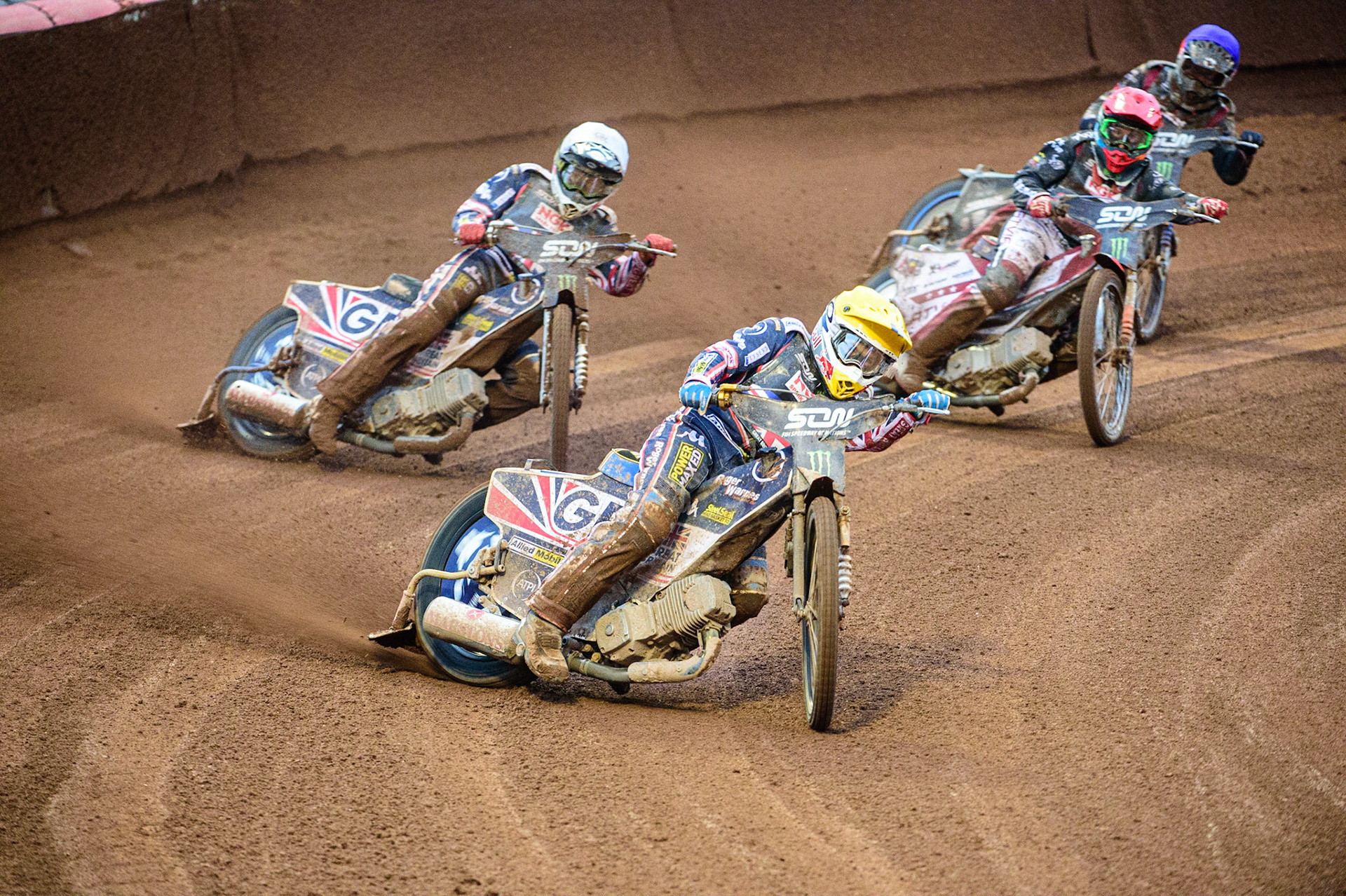 MANCHESTER, UK. OCT 17TH Robert Lambert of Great Britain (Yellow) leads Dan Bewley of Great Britain (White) Andzejs Lebedevs of Latvia (Red) and Olegs Mijailovs of Latvia (Blue) during the Monster Energy FIM Speedway of Nations at the National Speedway Stadium, Manchester on Sunday  17th October 2021. (Credit: Ian Charles | MI News)