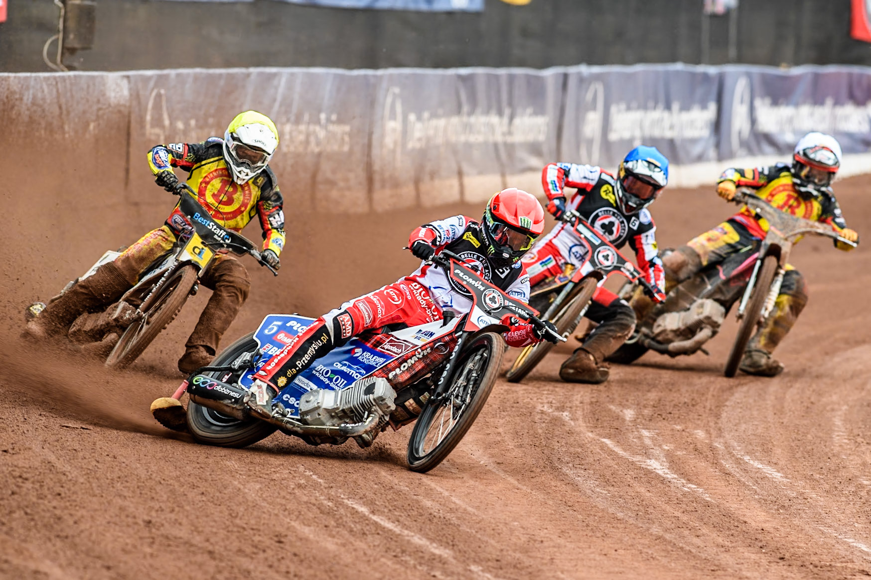 Belle Vue Aces' Dan Bewley  in Red leading Birmingham Brummies' Wiktor Lampart  in Yellow, Belle Vue Aces' Connor Mountain  in Blue and Birmingham Brummies' Leon Flint  in White during the Rowe Motor Oil Premiership match between Belle Vue Aces and Birmingham Brummies at the National Speedway Stadium, Manchester on Monday 6th May 2024. (Photo: Ian Charles | MI News)