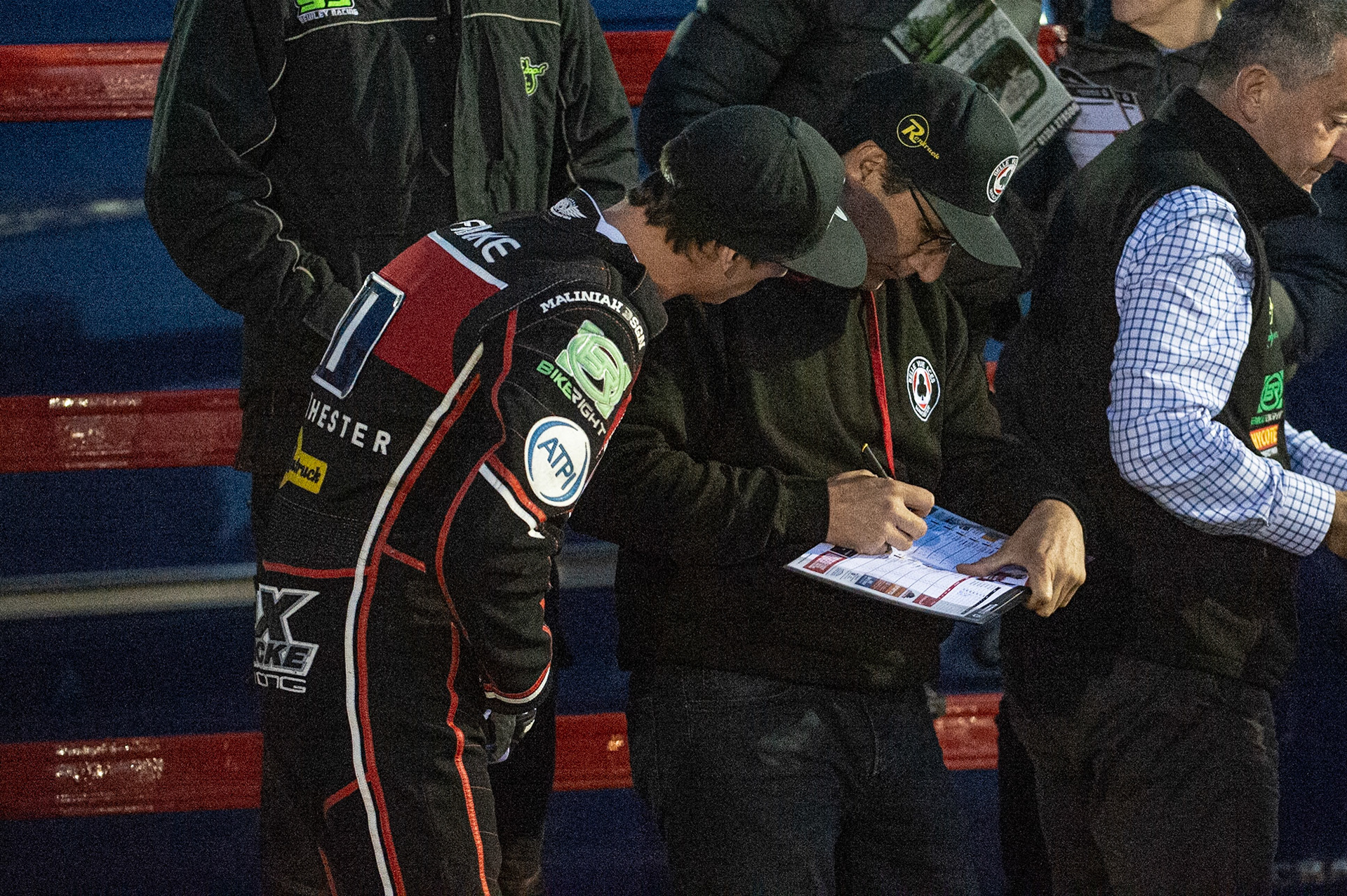 Photo by Ian Charles:

Max Fricke (left) checks Mark Lemon’s programme

Peterborough Panthers v Belle Vue Aces, British Speedway Premiership, Thursday, 5, September, 2019