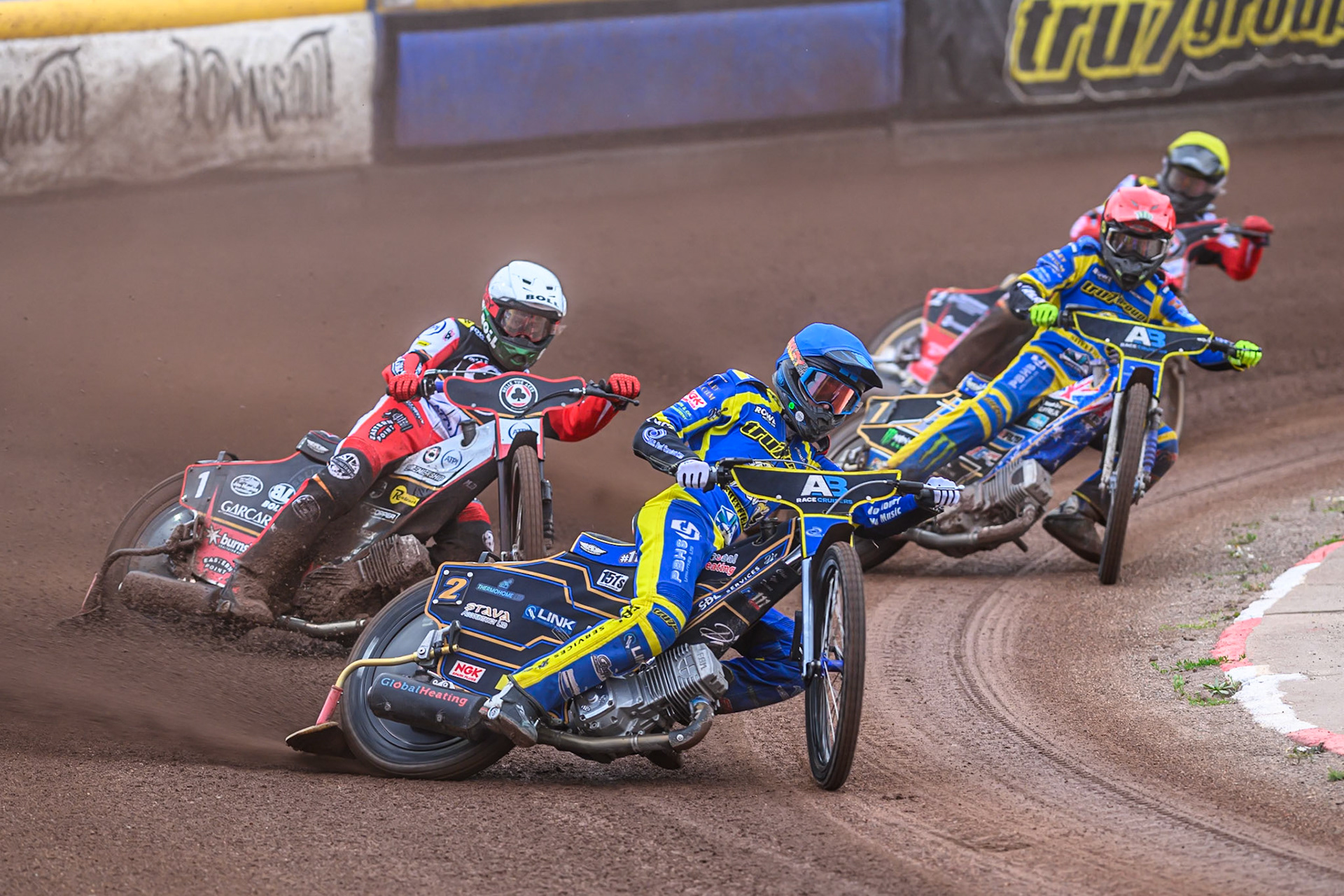 Anders Rowe of Sheffield Tigers  in Yellow leading Brady Kurtz of Belle Vue Aces   in White, Jack Holder of Sheffield Tigers  in Red and Norick Blodorn of Belle Vue Aces   in Yellow during the Rowe Motor Oil Premiership match between Sheffield Tigers and Belle Vue Aces at Owlerton Stadium, Sheffield on Monday 11th August 2025. (Photo: Ian Charles | MI News)