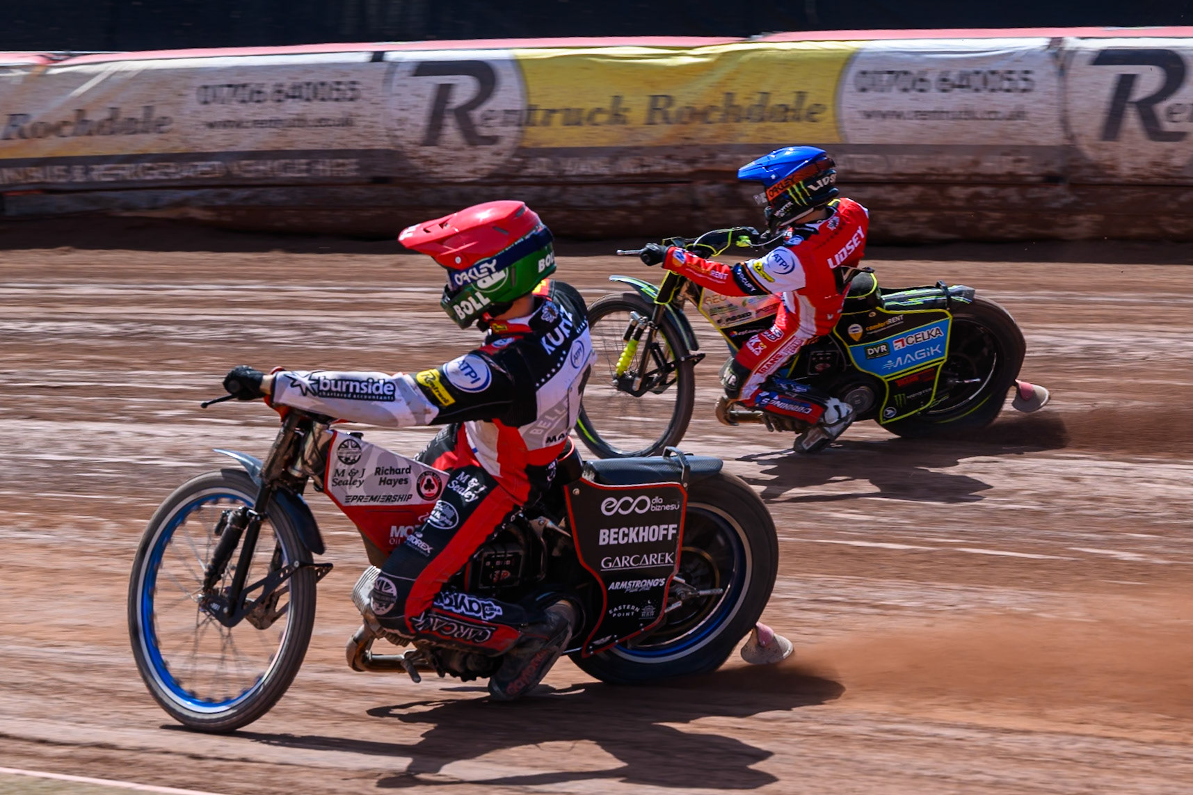 Brady Kurtz of Belle Vue Aces in Red rides inside Jaimon Lidsey, Guest Rider for Belle Vue Aces in Blue during the Rowe Motor Oil Premiership match between Belle Vue Aces and Sheffield Tigers at the National Speedway Stadium, Manchester on Monday 25th May 2026. (Photo: Ian Charles | MI News)
