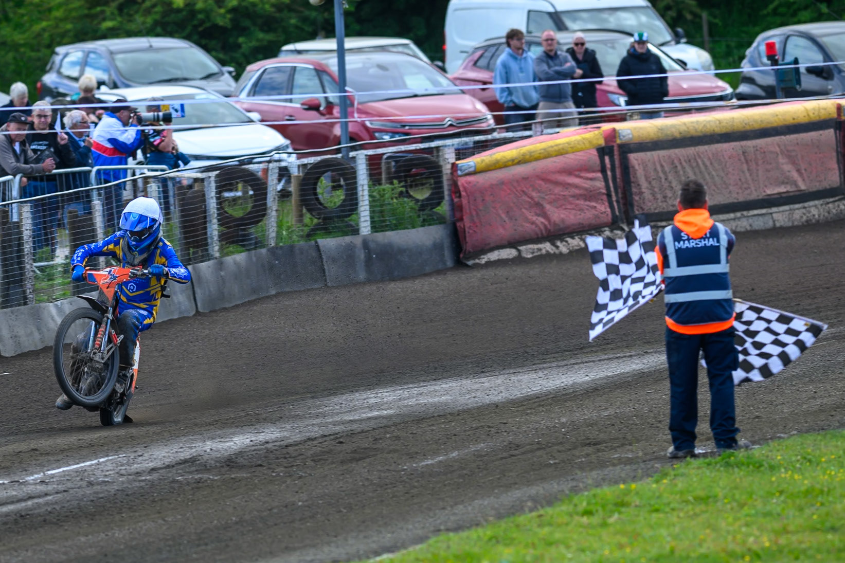 Jordy Loftus of Edinburgh Monarchs Academy  takes the chequered flag to win Heat 11 during the WSRA National Development League match between Buxton Bulls and Edinburgh Monarchs Academy at Hi-Edge Speedway, Buxton on Sunday 14th June 2026. (Photo: Ian Charles | MI News)